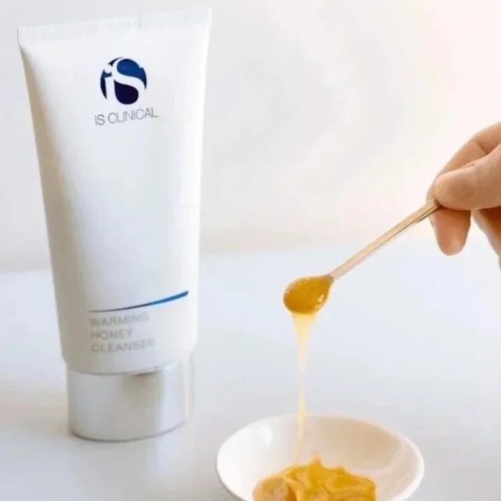 iS Clinical Warming Honey Cleanser for gentle enzymatic exfoliation.