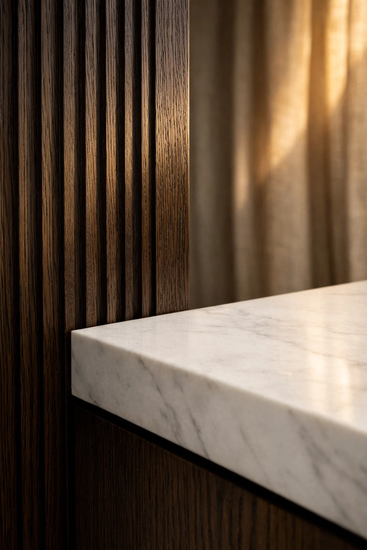 Close-up of luxury hotel suite materials showing high-end oak and marble textures in natural sunlight.