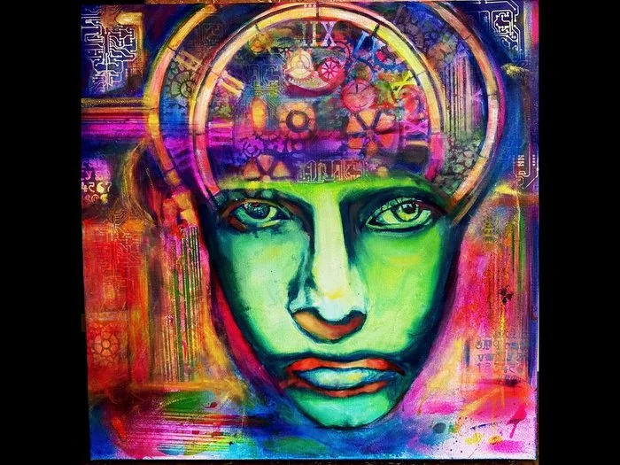 Colorful abstract painting of a person's face with green skin, large expressive eyes, and a background of clock gears and mathematical symbols.