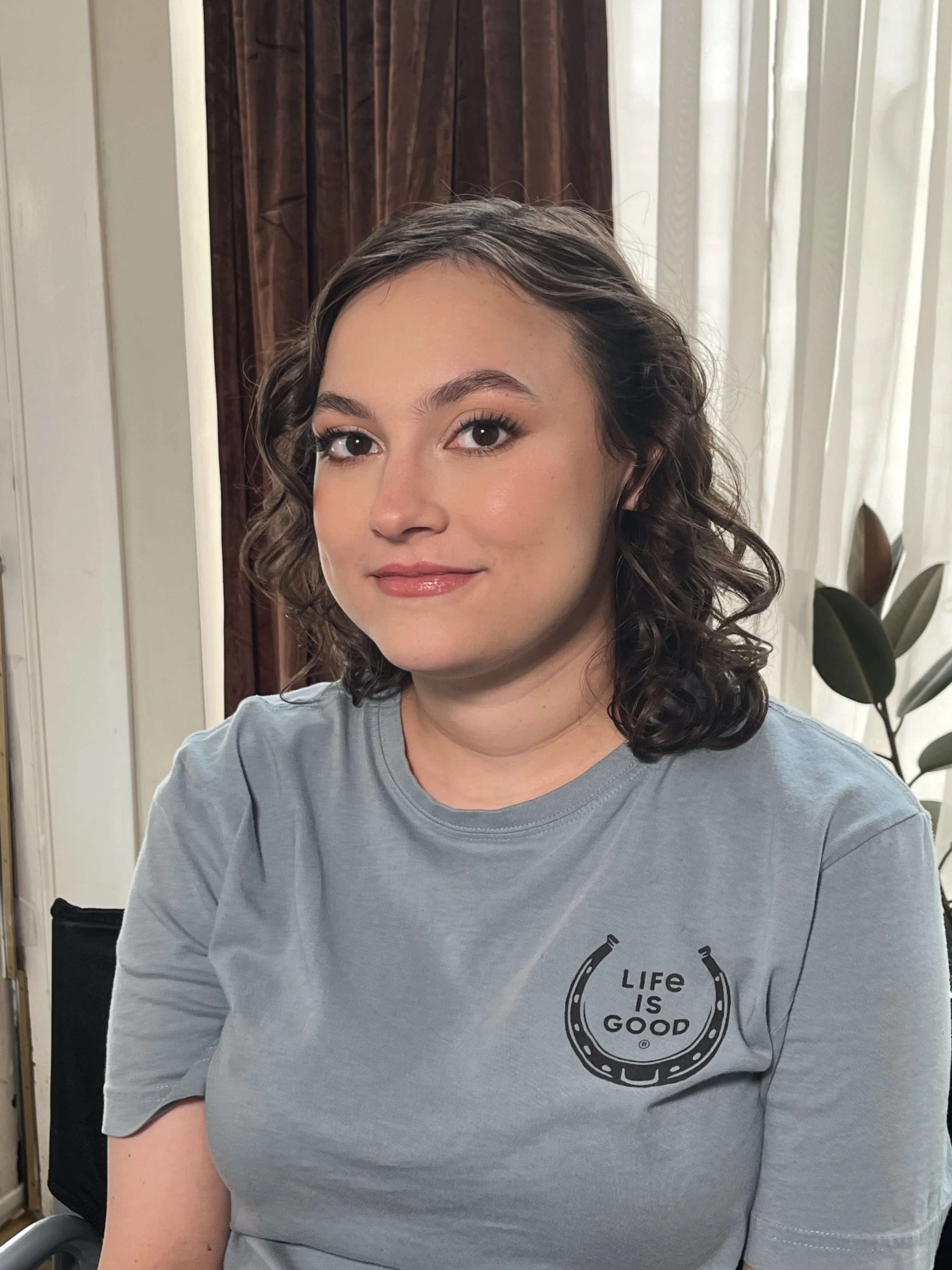 Caucasian Woman with a soft glam matte makeup look with neutral colors. Makeup done by Erica K.