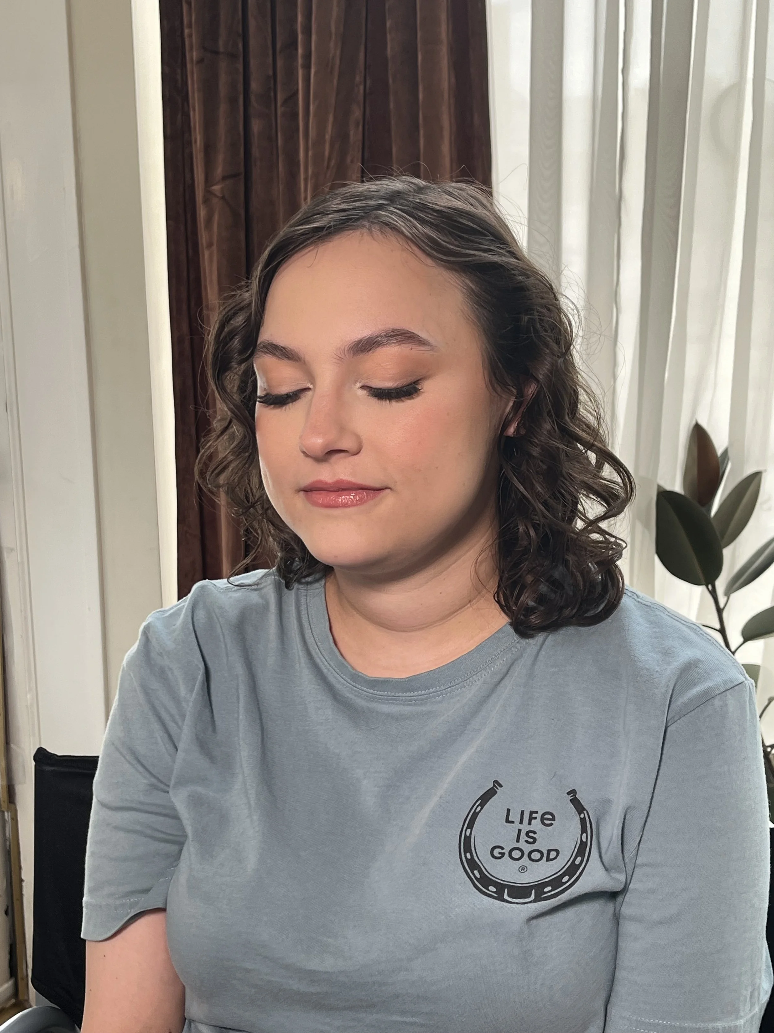 Caucasian Woman with a soft glam matte makeup look with neutral colors. Makeup done by Erica K.