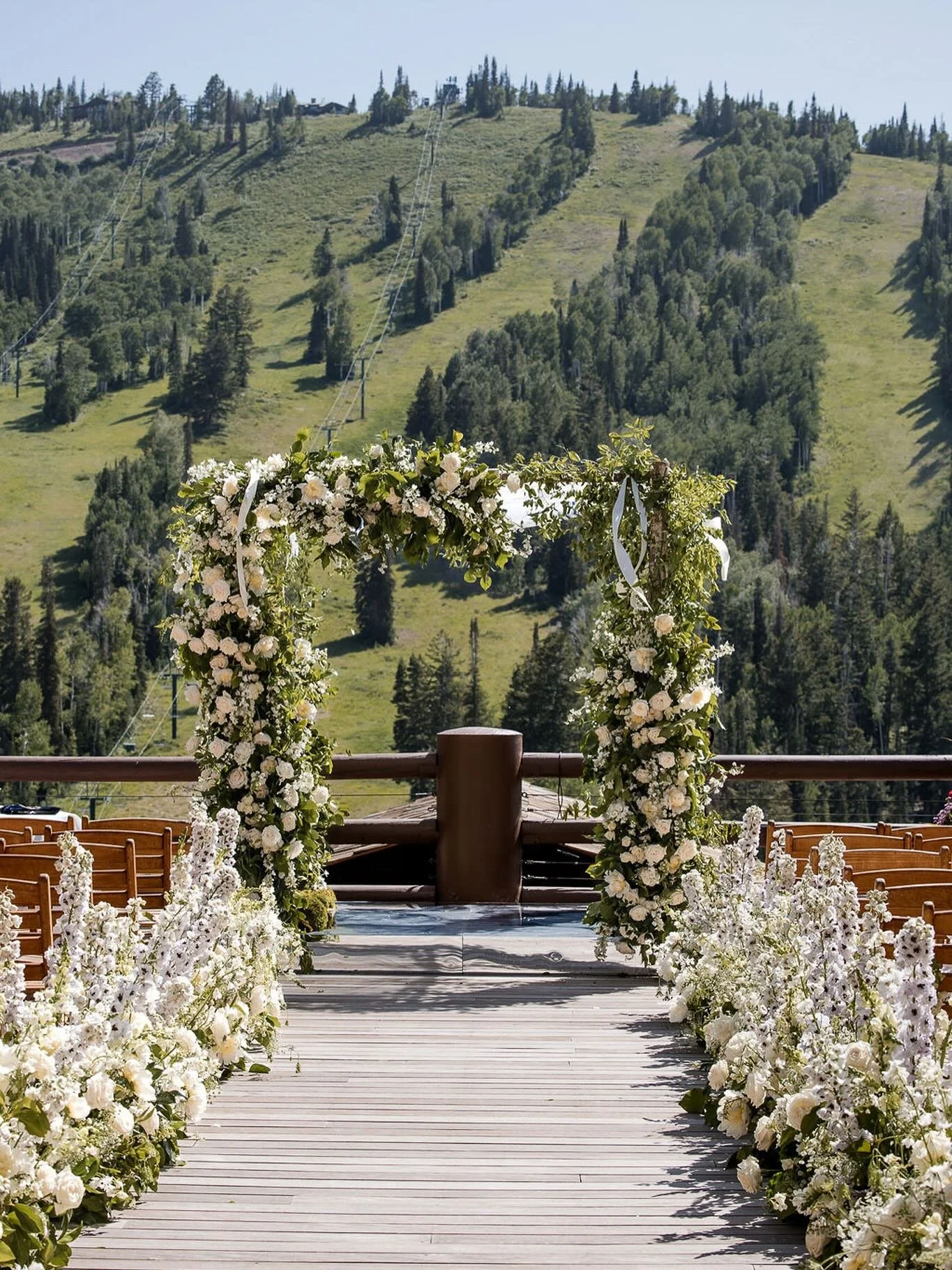 ✨ A ceremony with a view ✨ Surrounded by mountains, sunshine, and the sweetest blooms, this aisle was the perfect beginning to forever. 🌿🤍

#MountainWedding #CeremonyGoals #WeddingInspo #FloralArch #OutdoorWedding