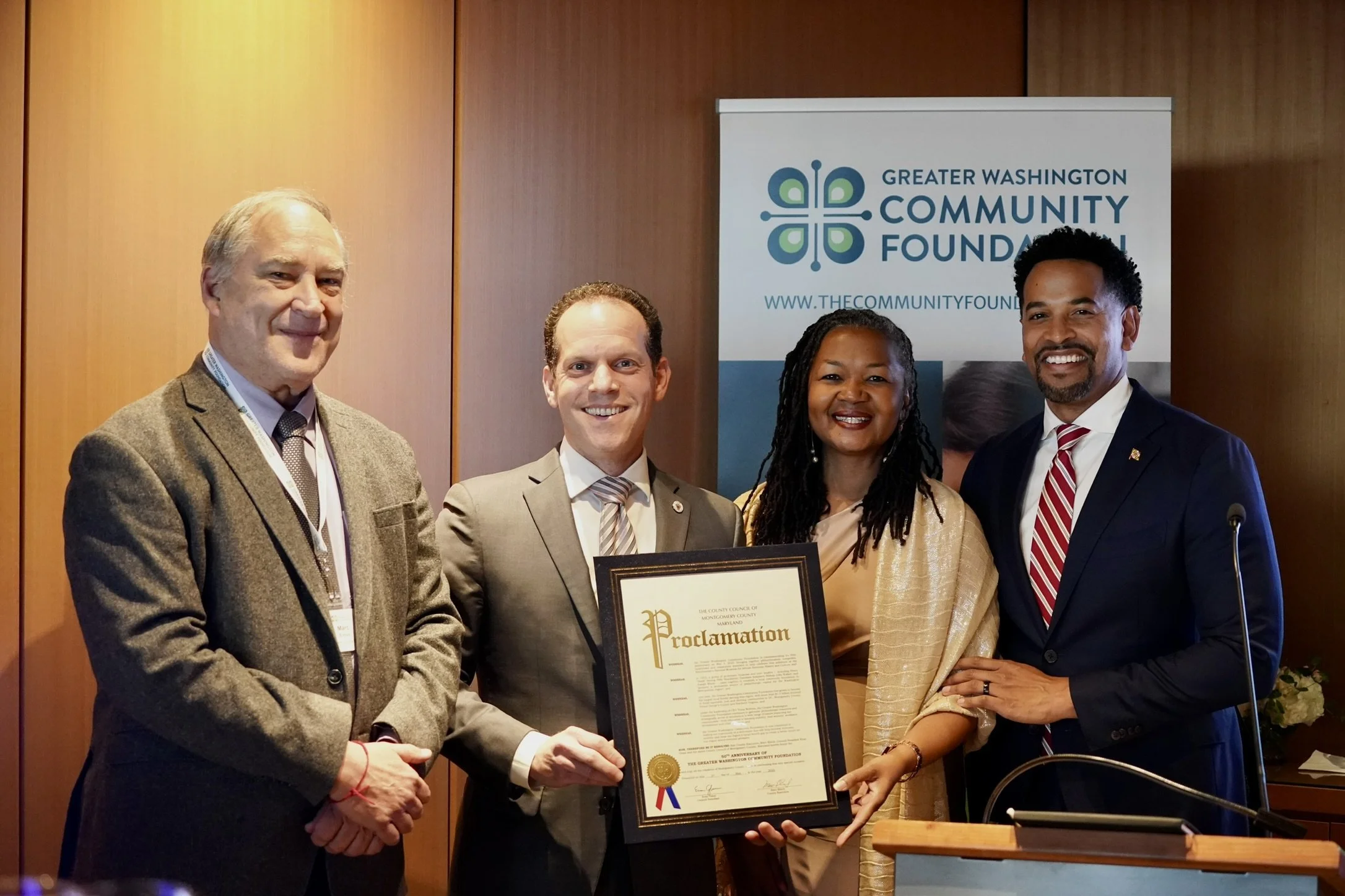 The Montgomery County Council represented by Council President Evan Glass (At-Large), Council Member Will Jawando (At-Large), and County Executive Marc Elrich, presented The Community Foundation with a proclamation in honor of its 50th Anniversary.