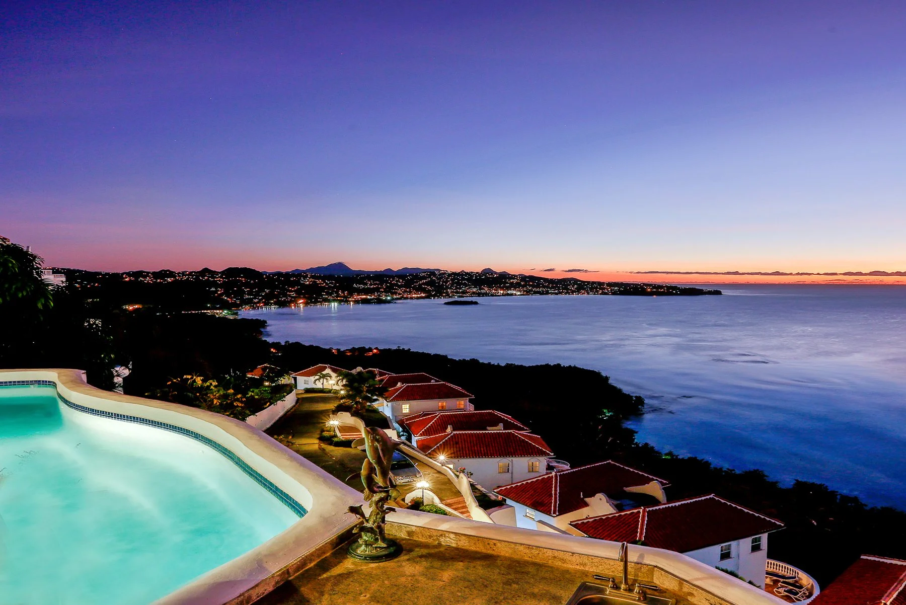Villa Periwinkle--Pool With Ocean View at sunset.jpg
