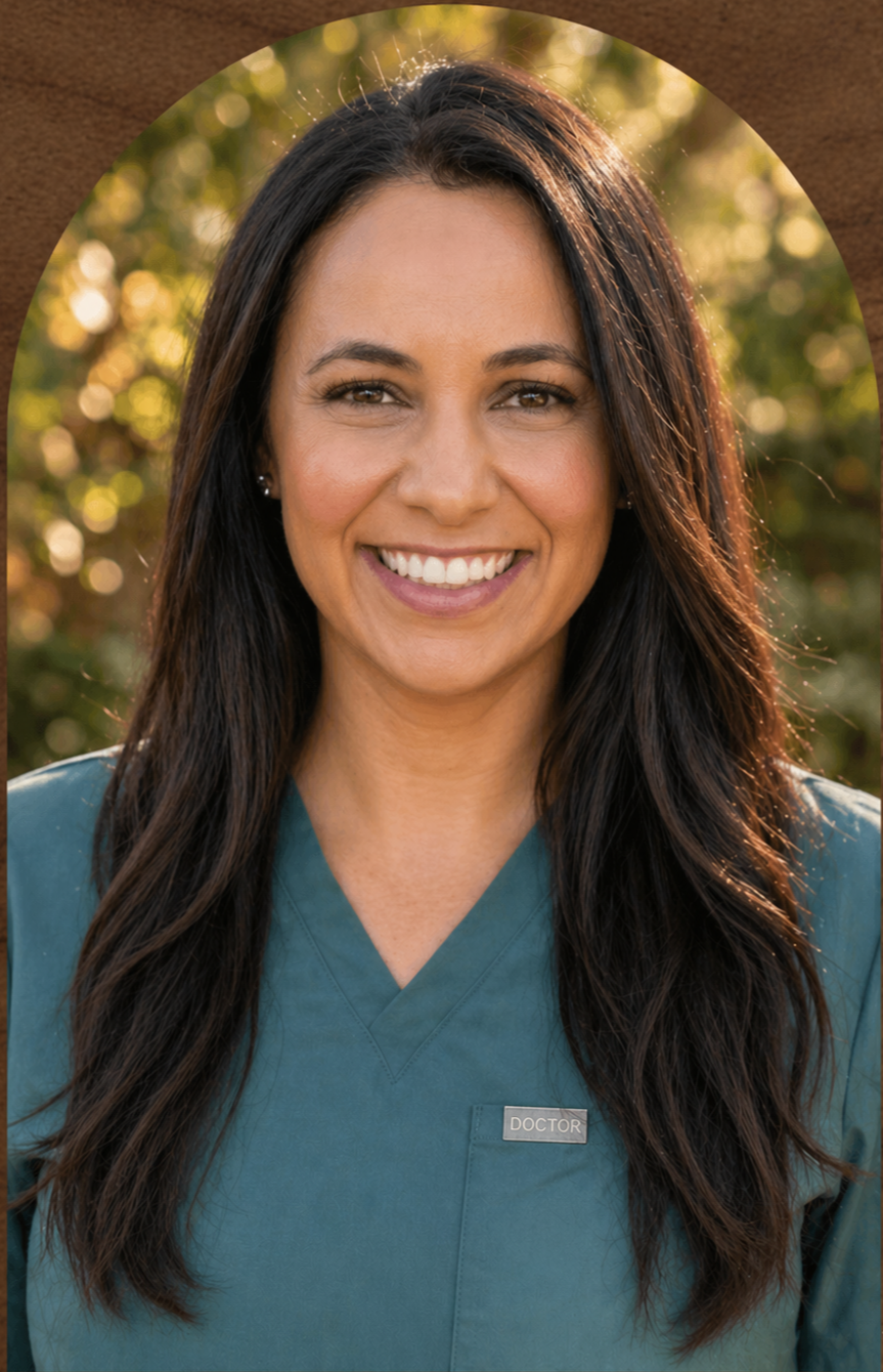 headshot image of Dr. Manson smiling.