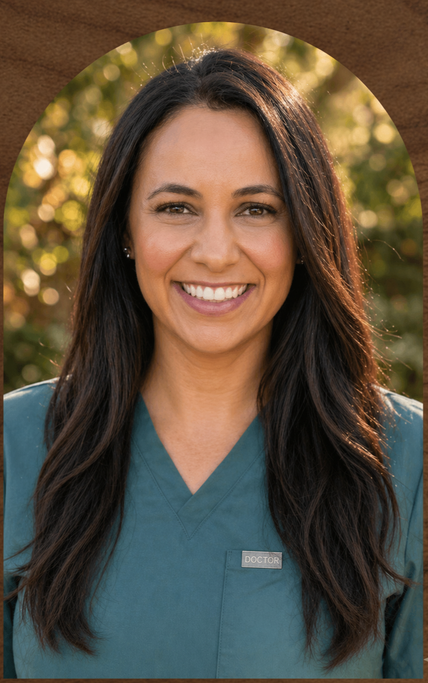 headshot image of Dr. Manson smiling.