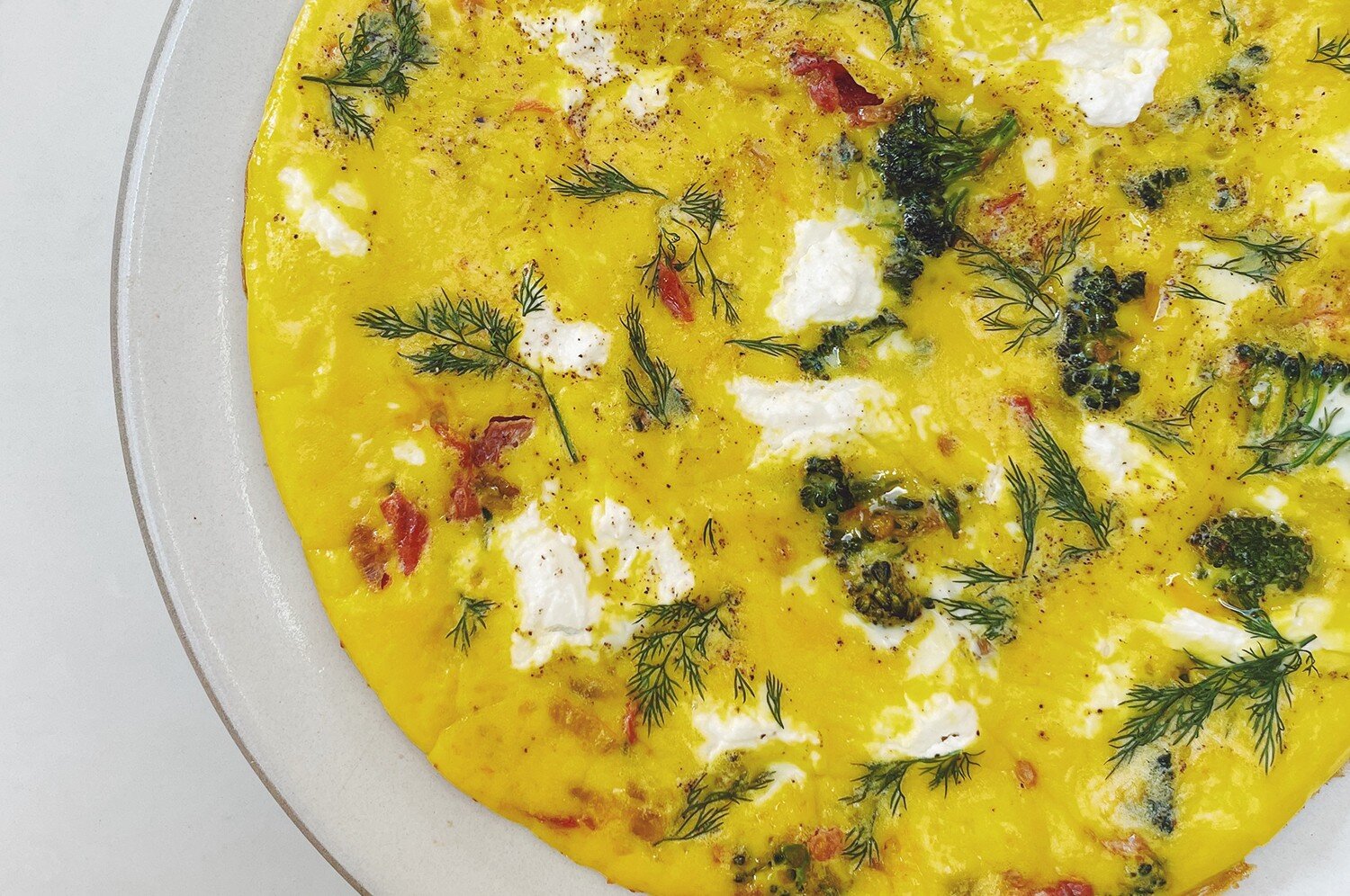 Frittata with Tomato, Baby Broccoli, and Goat Cheese
