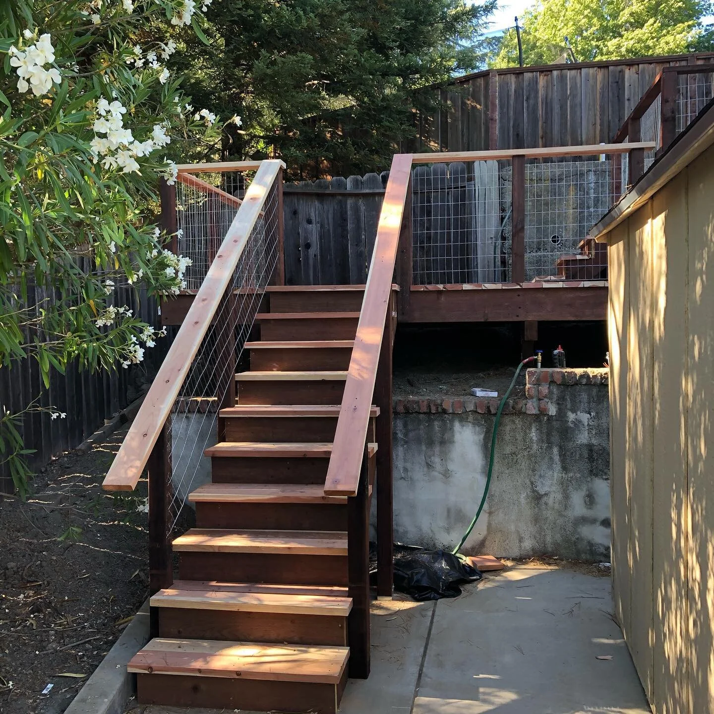 I took what used to be an unused corner of this customer&rsquo;s property and created a space for hosting, hanging out and practicing their golf swing. Project included 11&rsquo; by 12&rsquo; deck and 12&rsquo; by 24&rsquo; level area above a new ret