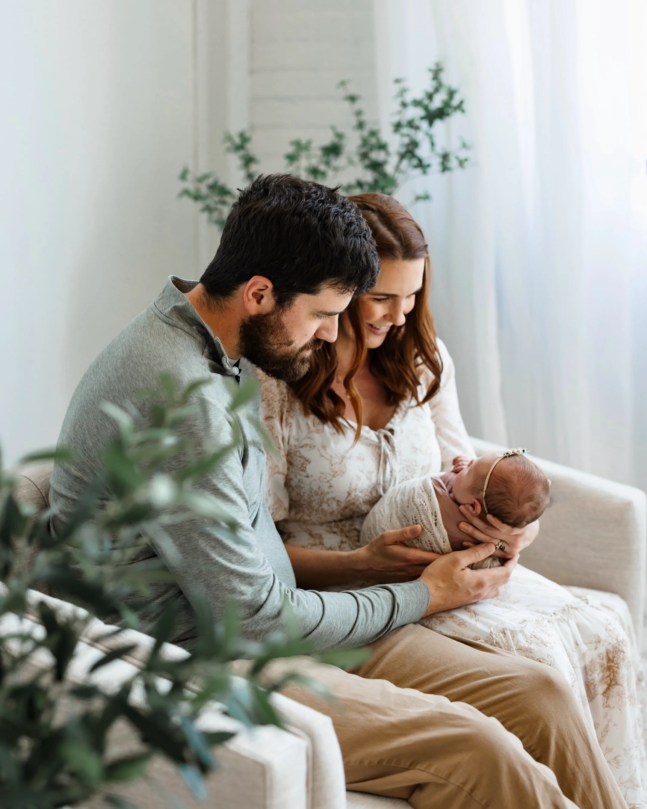 My studio in Northeast Minneapolis is the perfect place for your newborn photo session! I arrange my space differently each session day to fit the specific needs of every client. An array of plants, couches, pillows, room dividers, and even an ornate