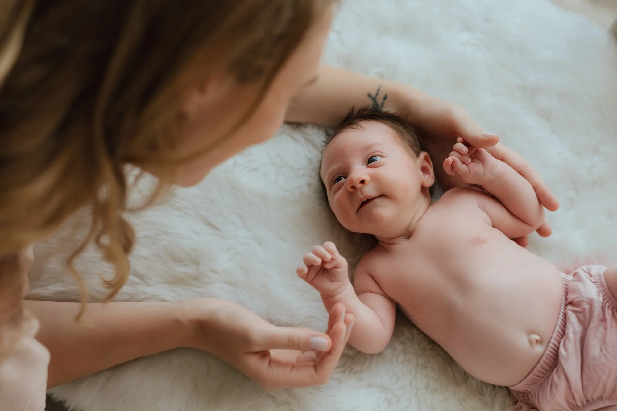 What Happens at a Minneapolis Newborn Photography Session with AMG Photography?