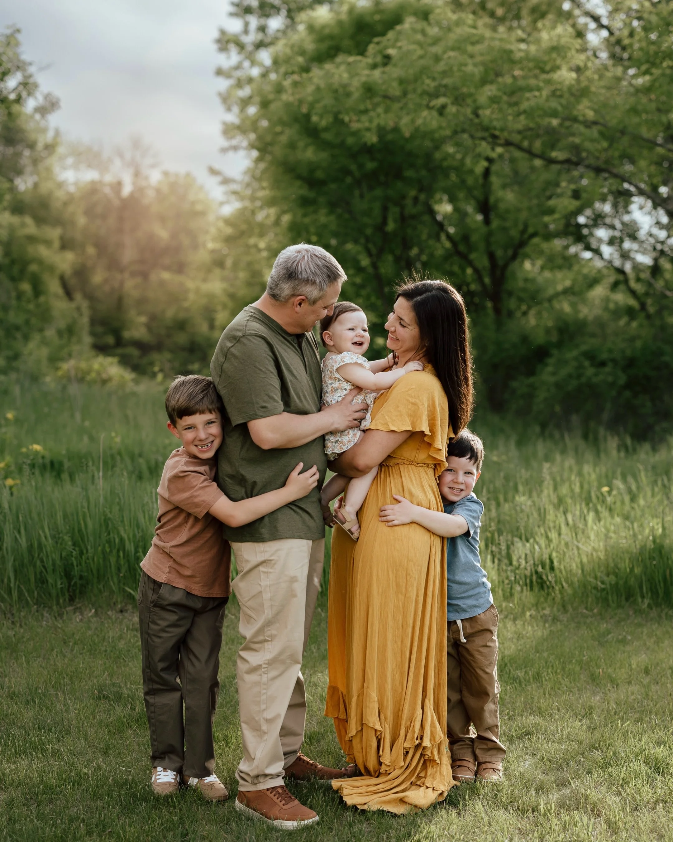 This family had the most perfect color palette for their summer photo session! Yellow can be such a wonderful choice for outdoor photos&mdash;it enhances that beautiful light we&rsquo;re looking for! 

When my milestone clients come back to capture a
