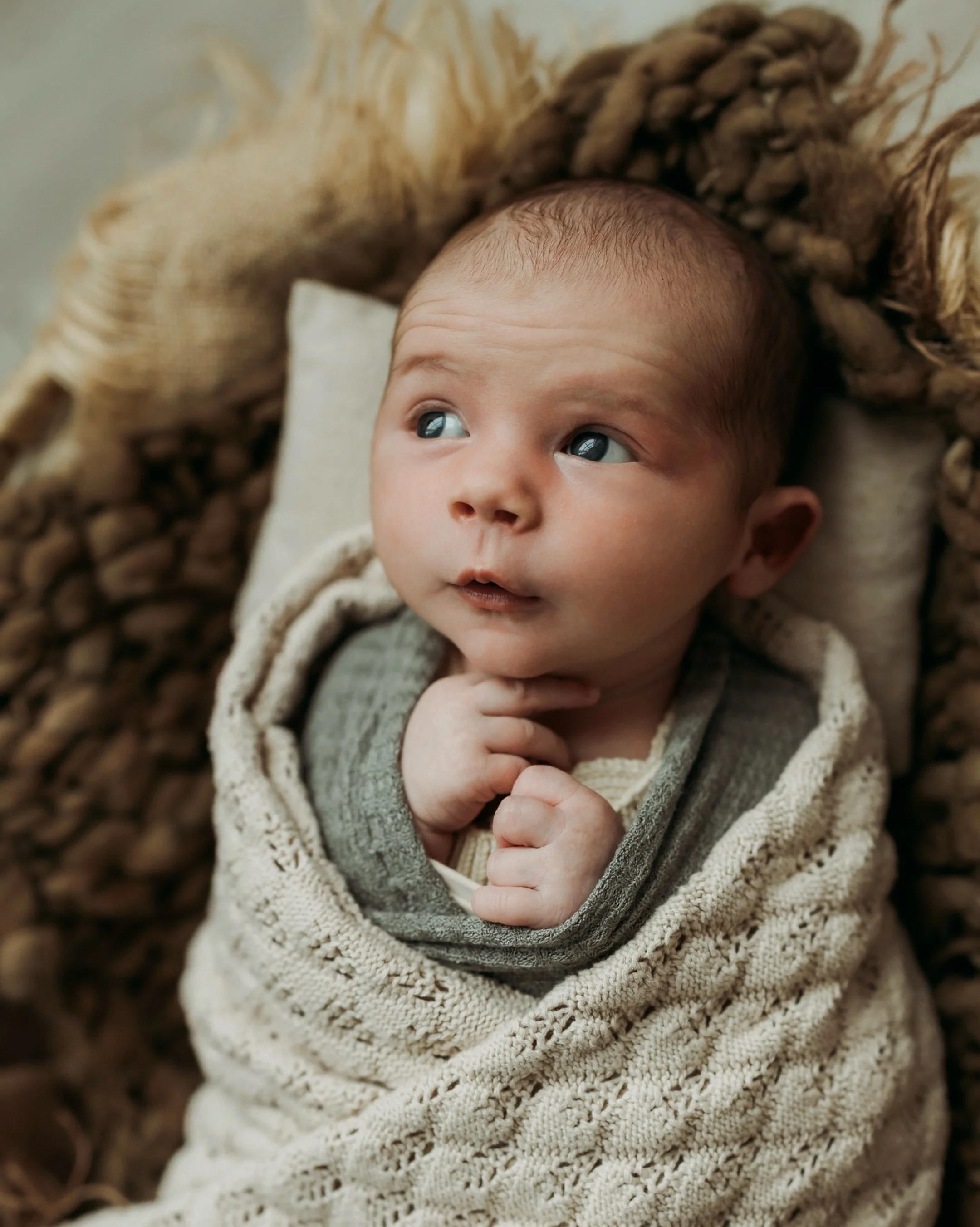 Newborn Session details
What is a newborn session experience like with me?  It is on of my favorite services to provide families.  As soon as you walk into the studio, it is my goal to help you feel welcomed and invited to relax.  Tea or coffee and s