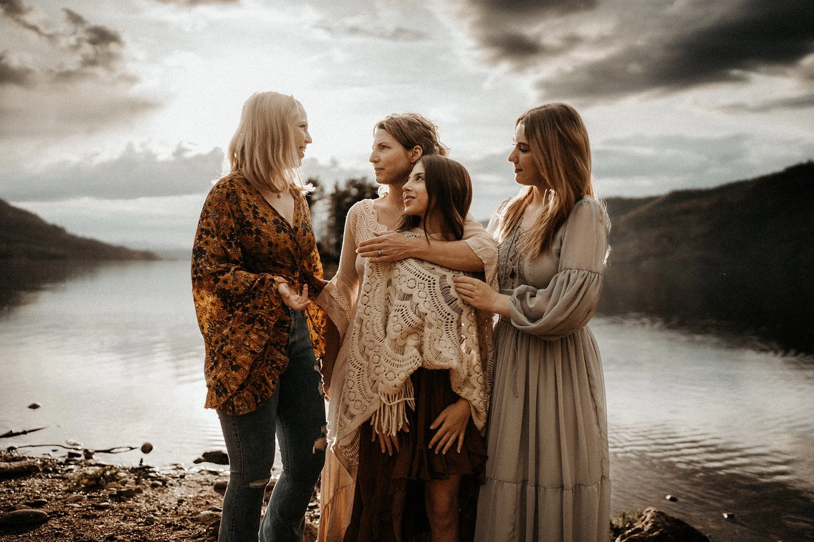 ann marie and her daughters by a lake
