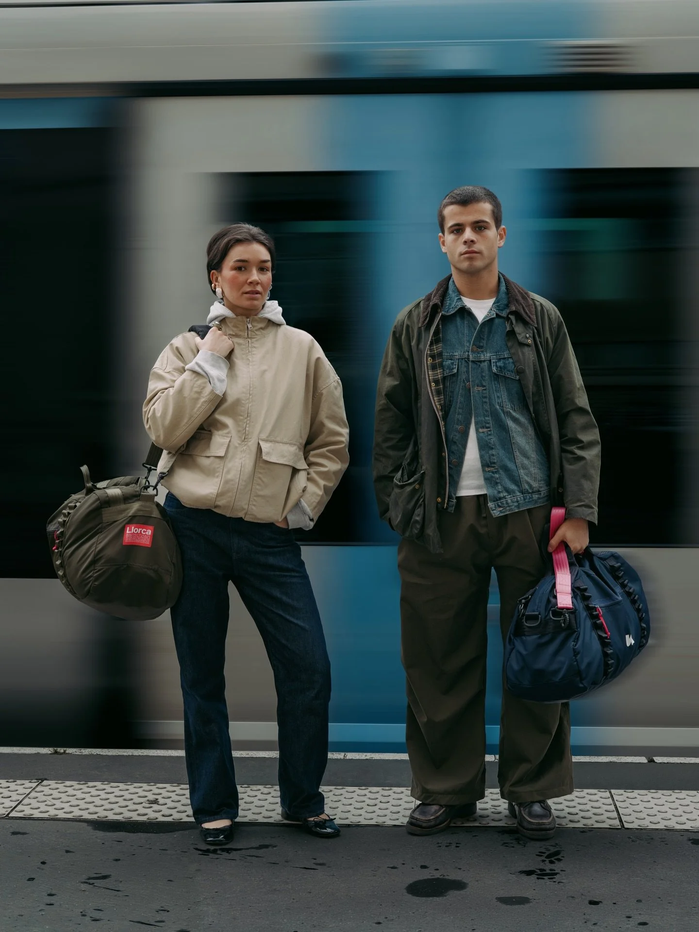 Erika and Vincent wearing our duffle bag, the DB-211 [L] in khaki and navy. 
Available online and in our workshop.