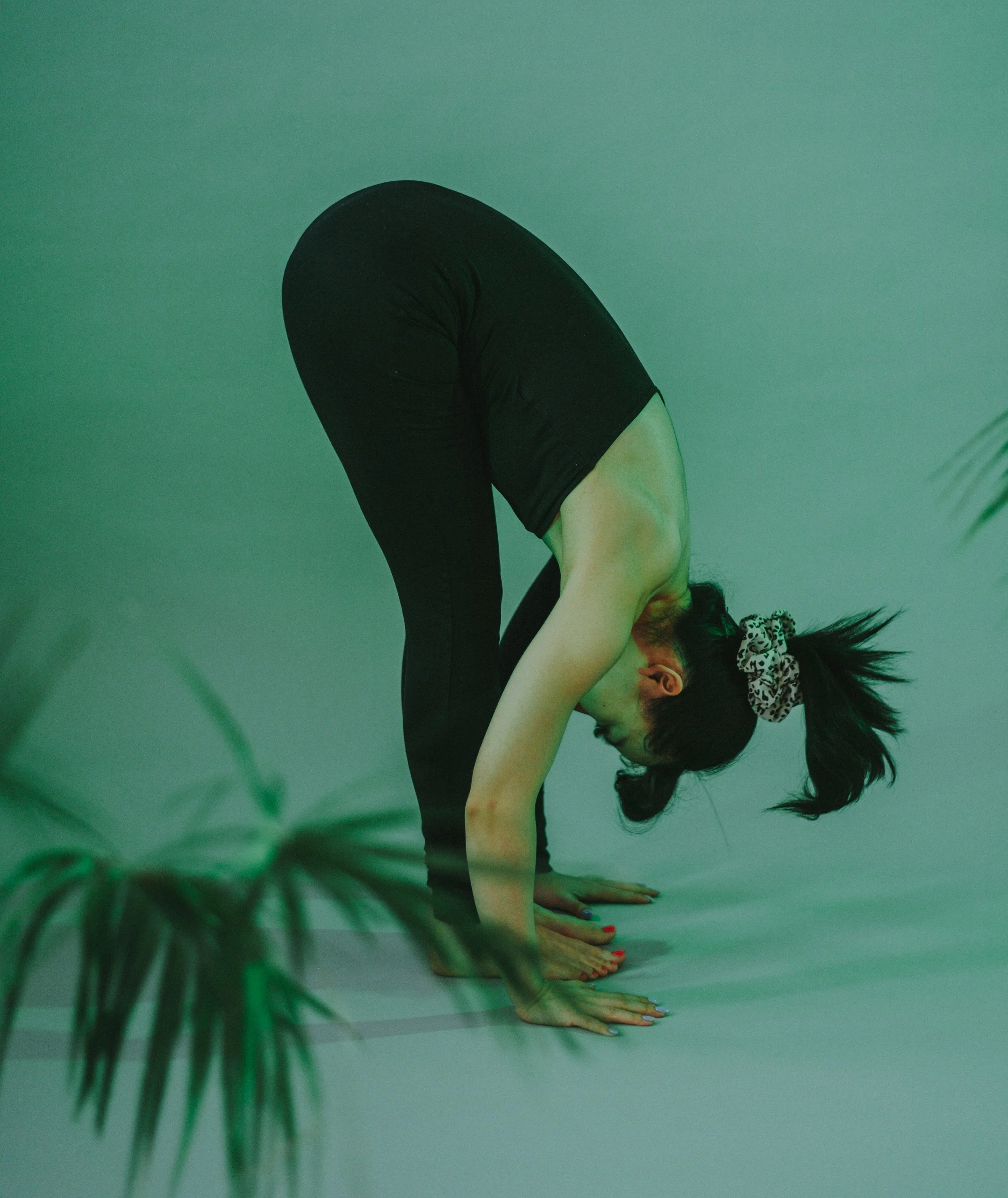 Female yogi practicing restorative yoga