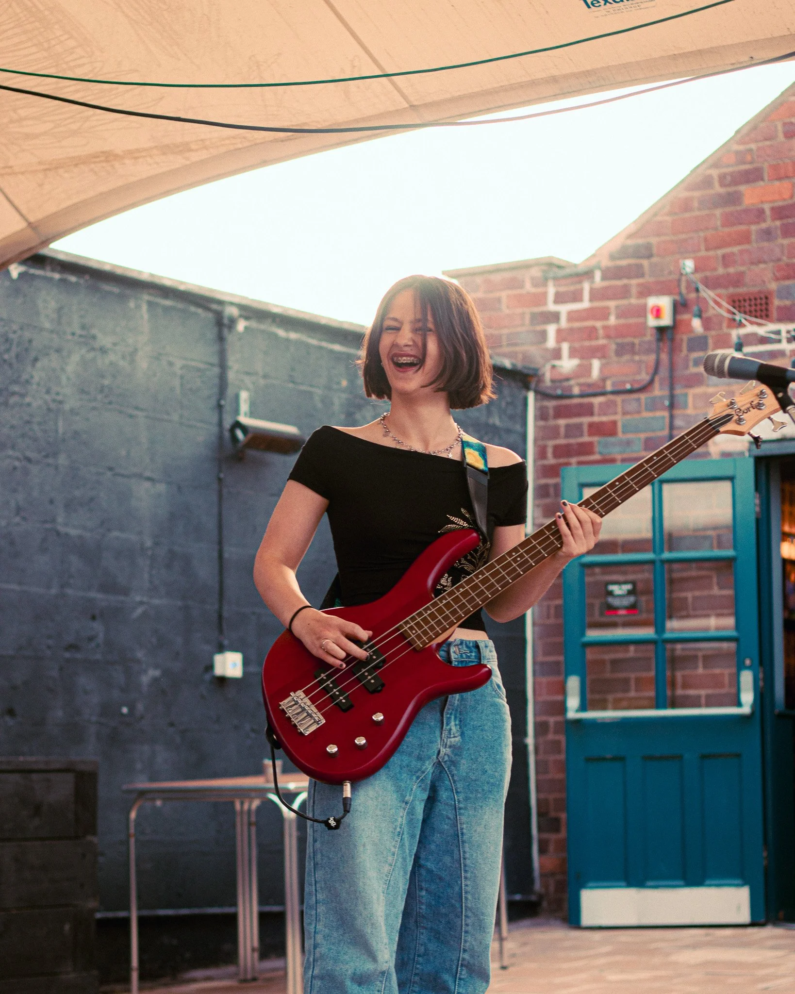 Patrilineals performing outdoors at Kidderminster Music Festival 2024