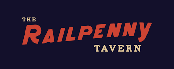 Logo of The Railpenny Tavern with stylized text on a dark background.
