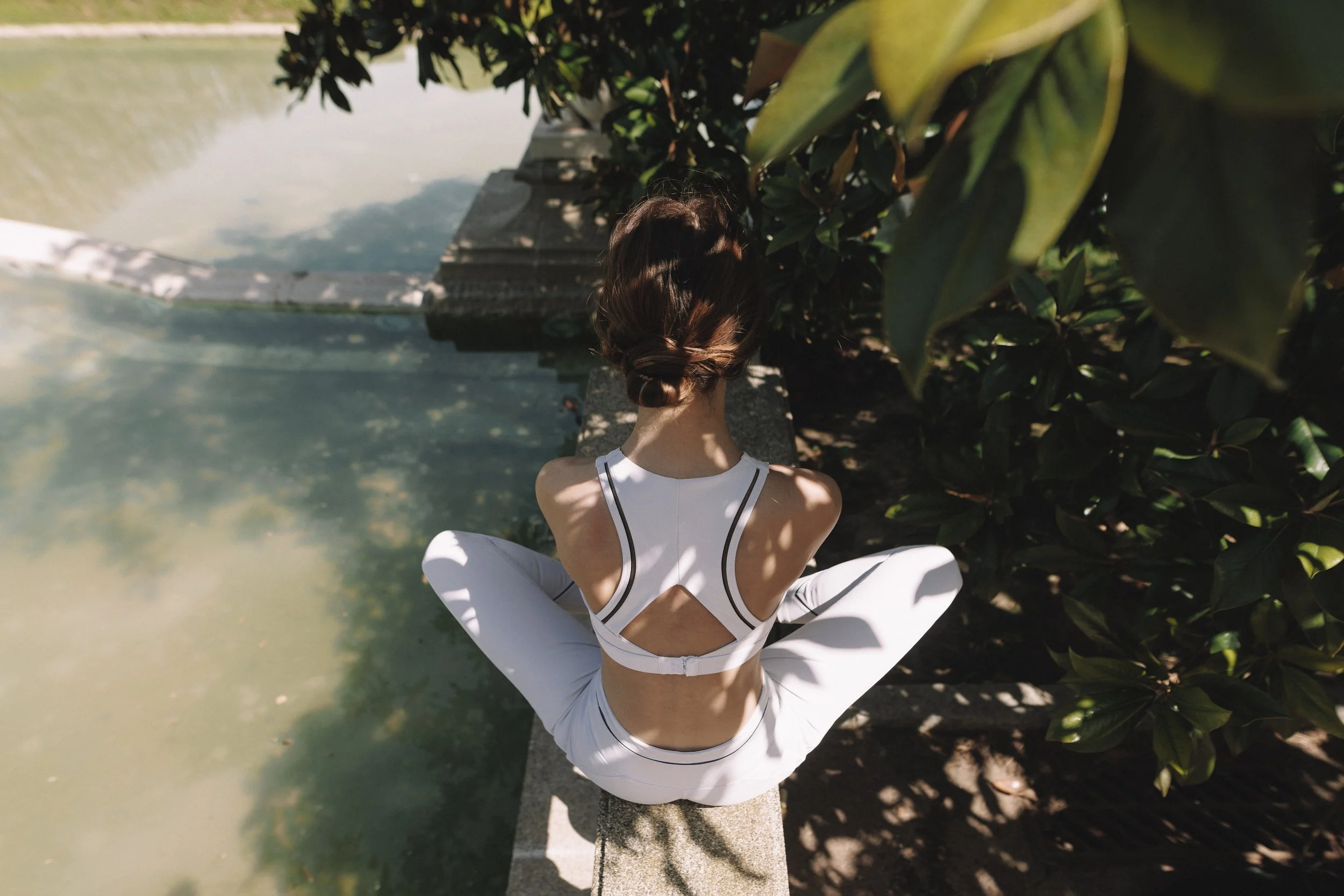 Alba Cañizares private yoga session in a light-filled Barcelona open space: lotus