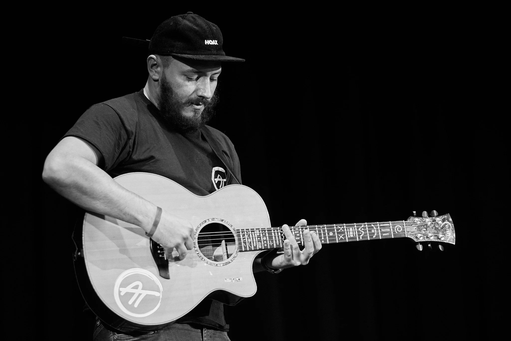 Adam Thomas and his guitar