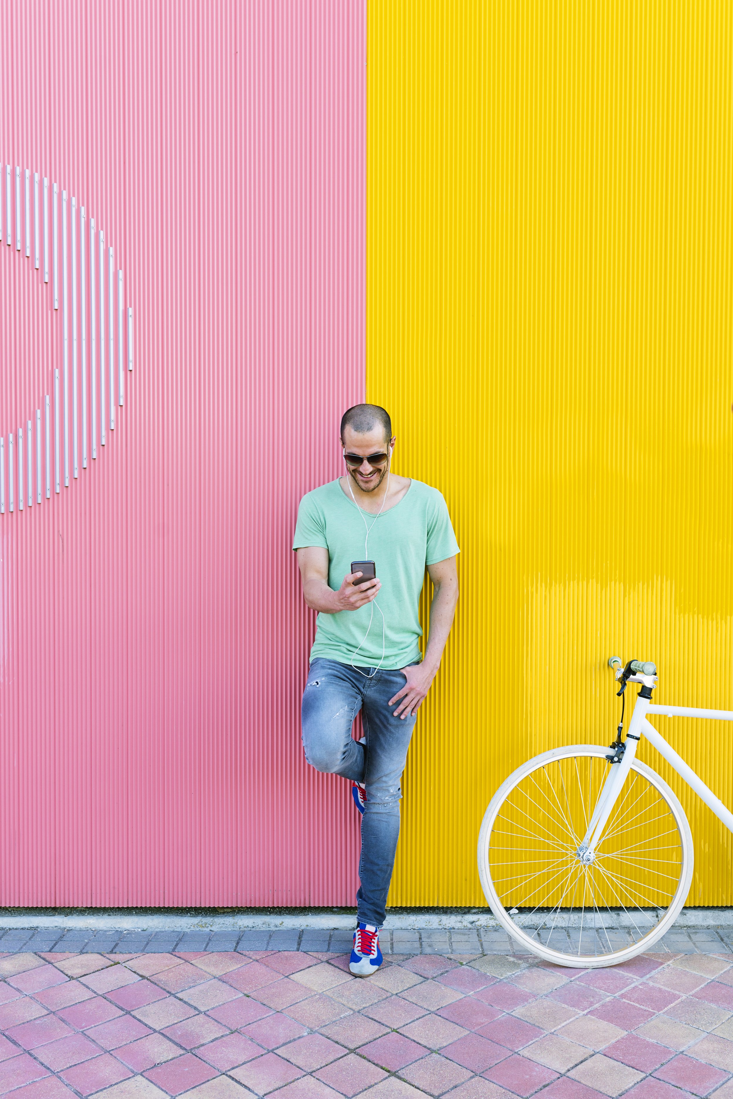 handsome-young-man-with-mobile-phone-and-fixed-gea-2024-10-18-05-52-36-utc.jpg