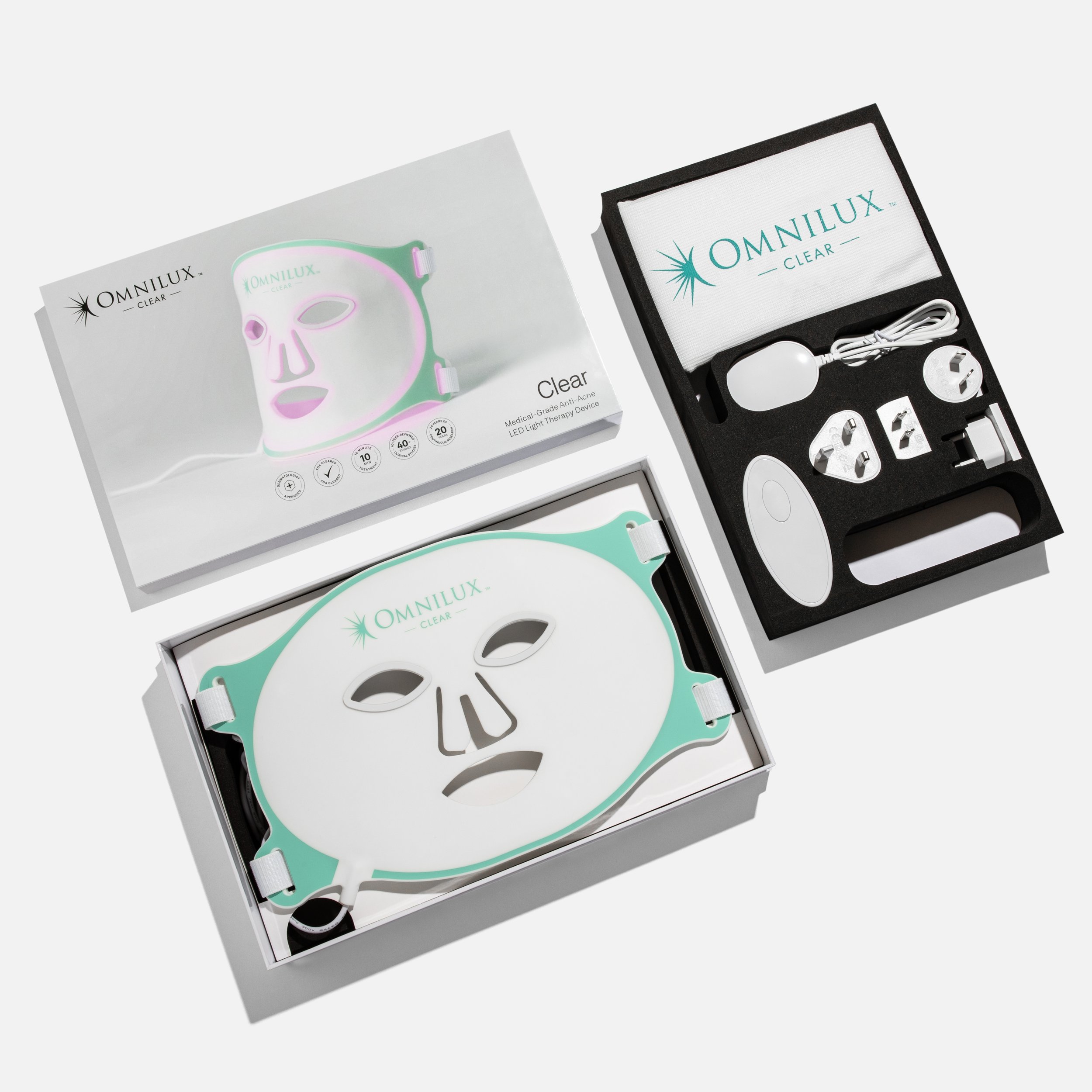 Omnilux LED mask in original packaging with charging cable and electronic accessories included
