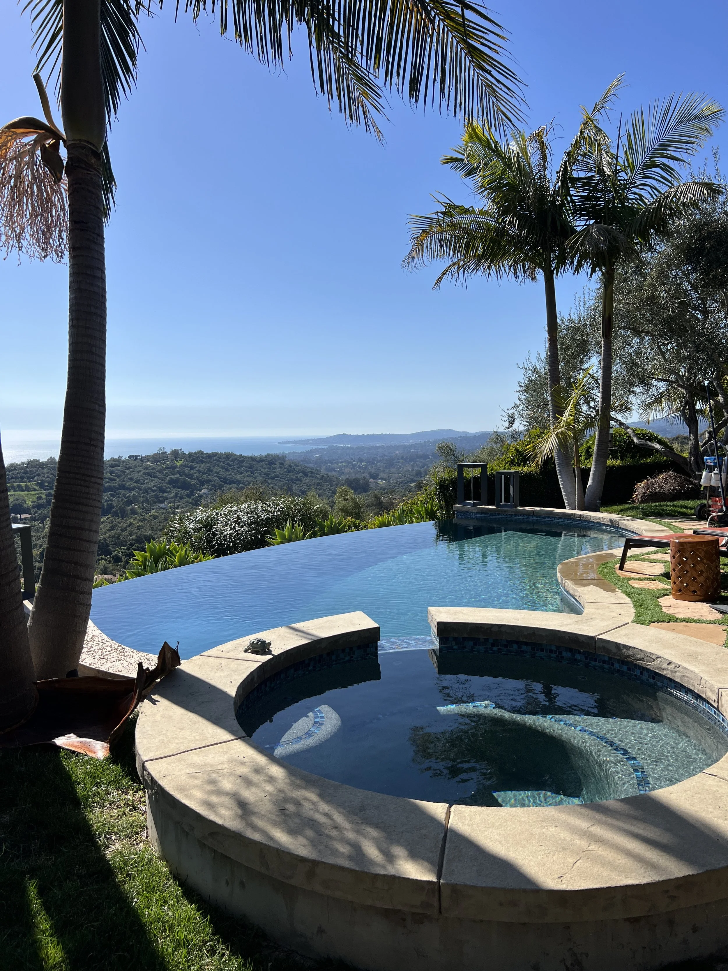 Infinity edge pool service overlooking Montecito.