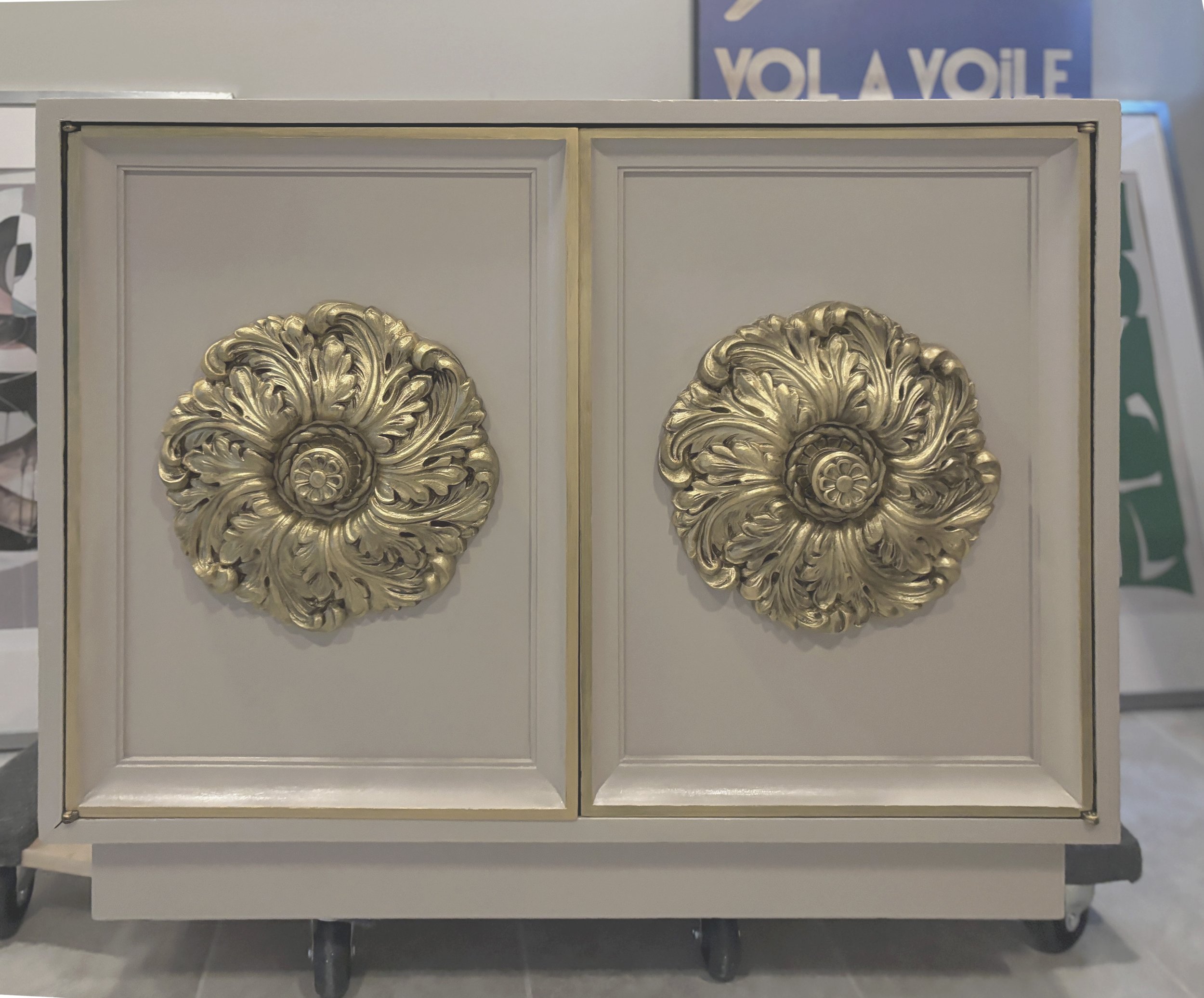After – front view (light taupe cabinet)
Refinished James Mont cabinet in soft taupe lacquer with hand-gilded medallions, ready for its new home in Lizeth’s living room. Photos of project coming soon. 
