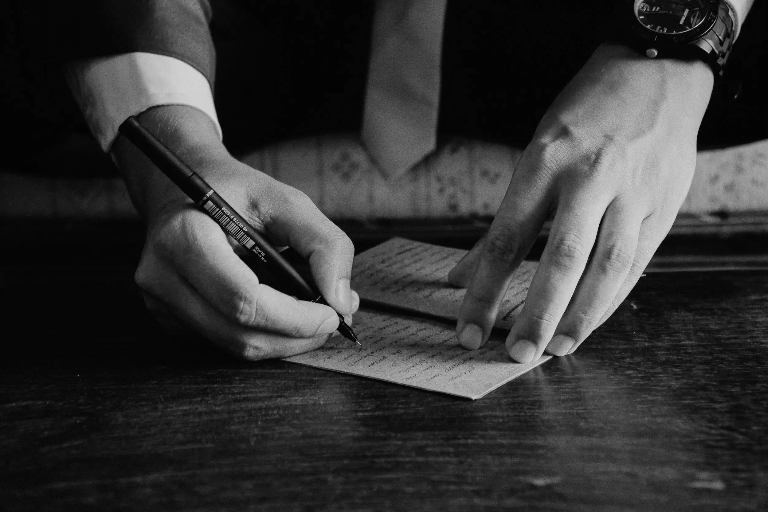 Borrower signing first lien mortgage documents, illustrating a lender's primary claim on a property.