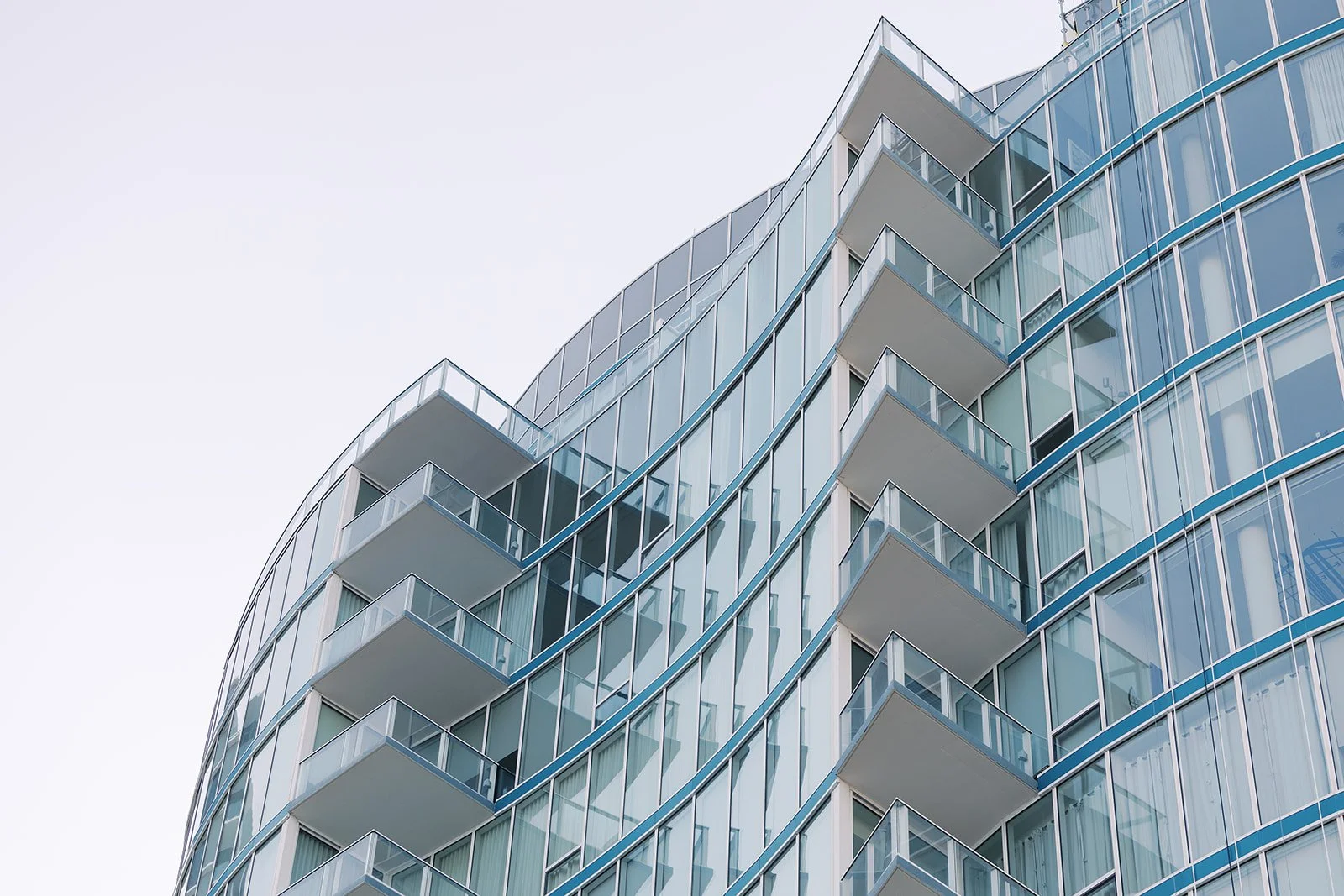 Luxury residential building representing real estate backed alternative investments for accredited investors.