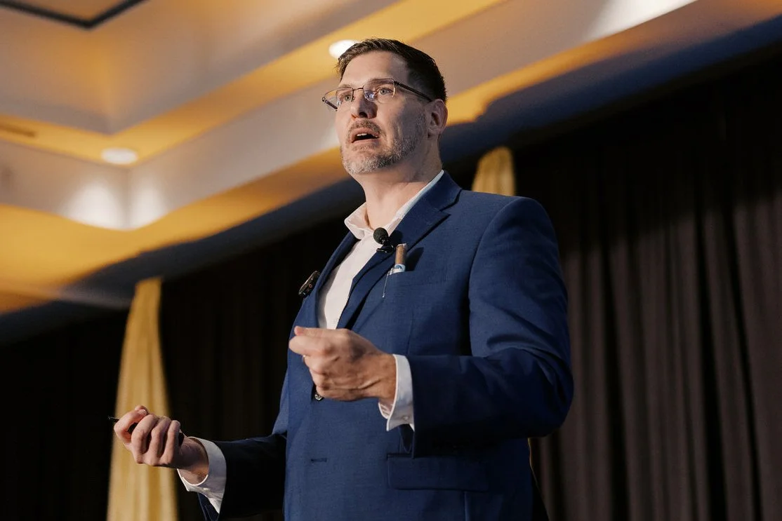 Edwin Epperson speaking at a business event, sharing strategies to help business owners sell your business fast and protect their wealth after an exit.