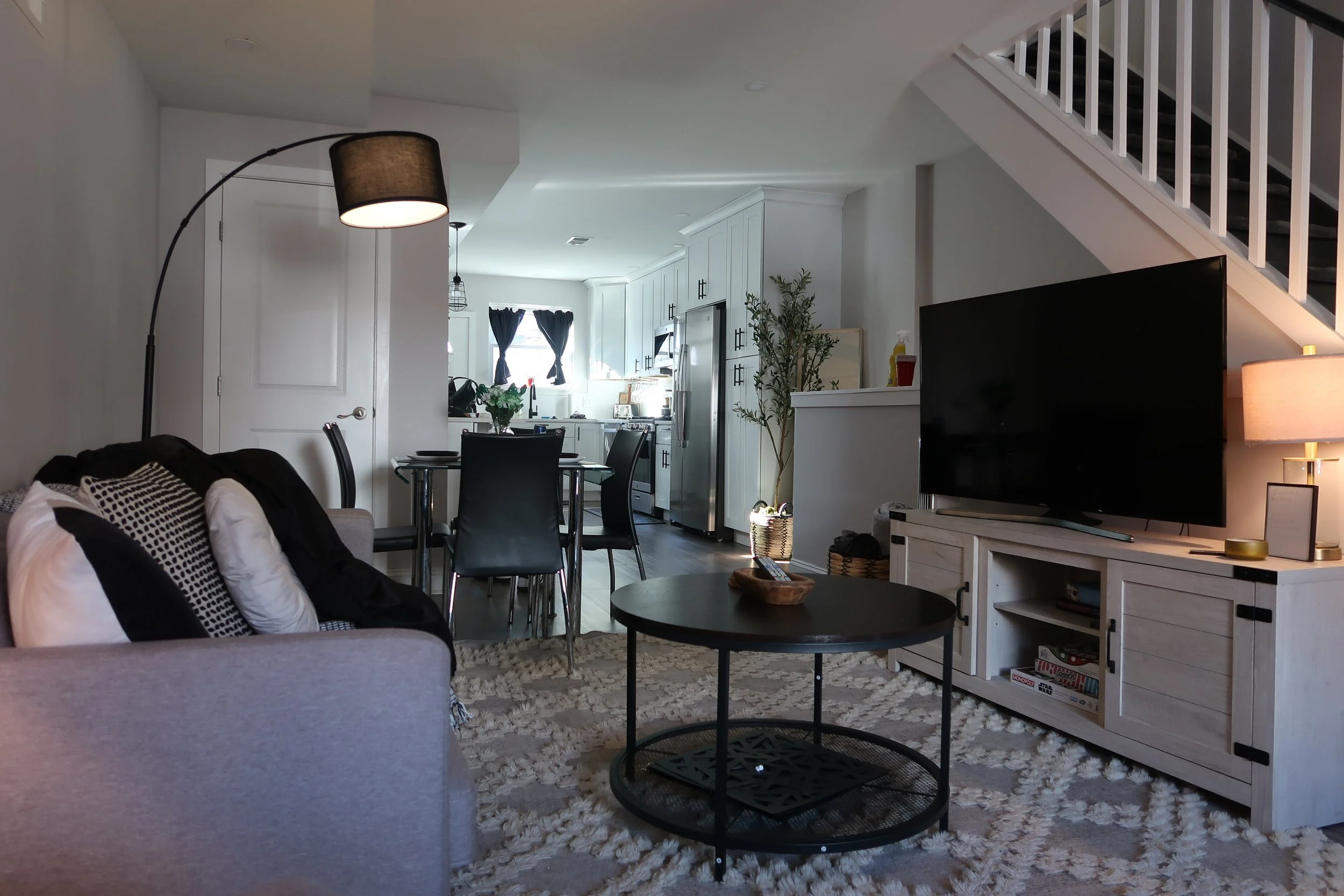 living room with smart tv and pull out sofa 