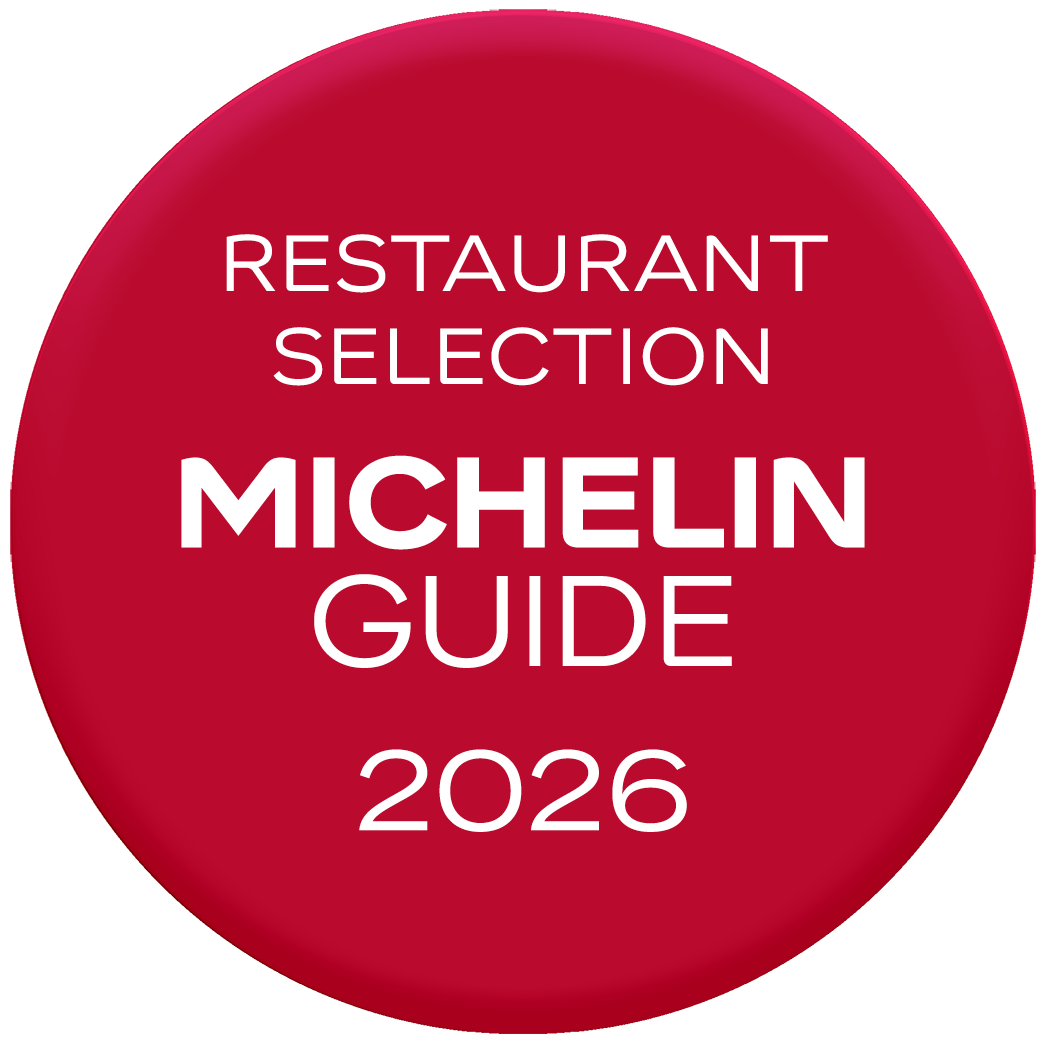 Red circular badge with white text reading 'Restaurant Selection Michelin Guide 2026'.