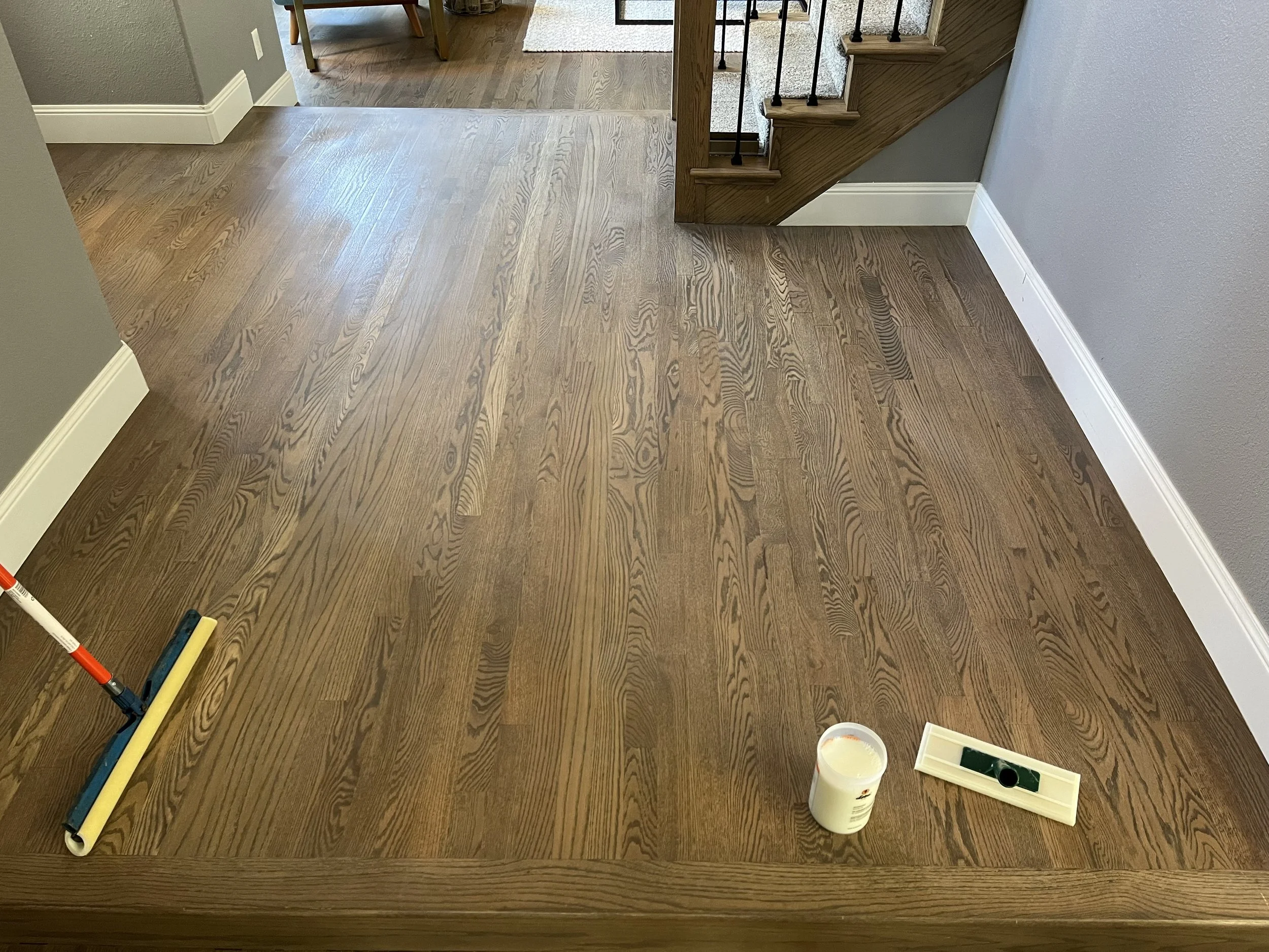 Screen and coat a gray stained red oak floor