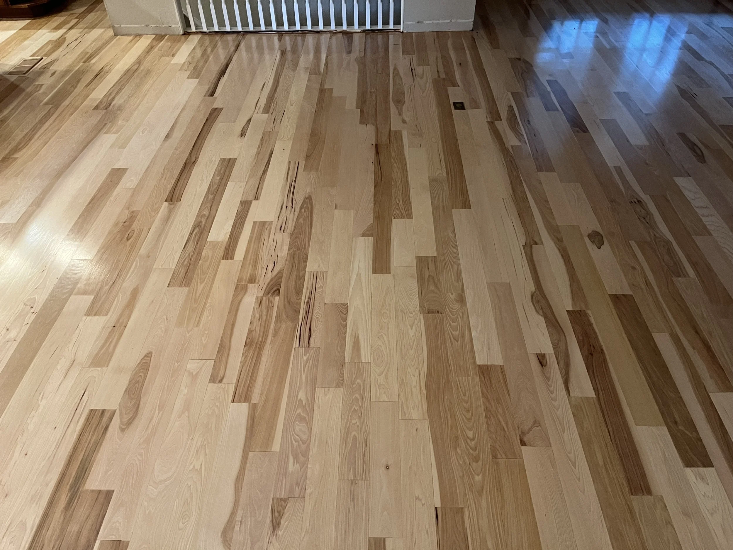 Prefinished hickory refinished to natural