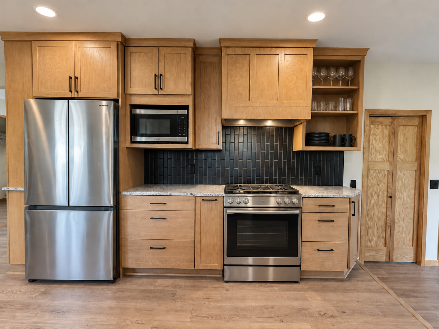 Taking the appliances off the counters for more space. A custom range hood. Also, we took the closet and made it a walk-in pantry! 