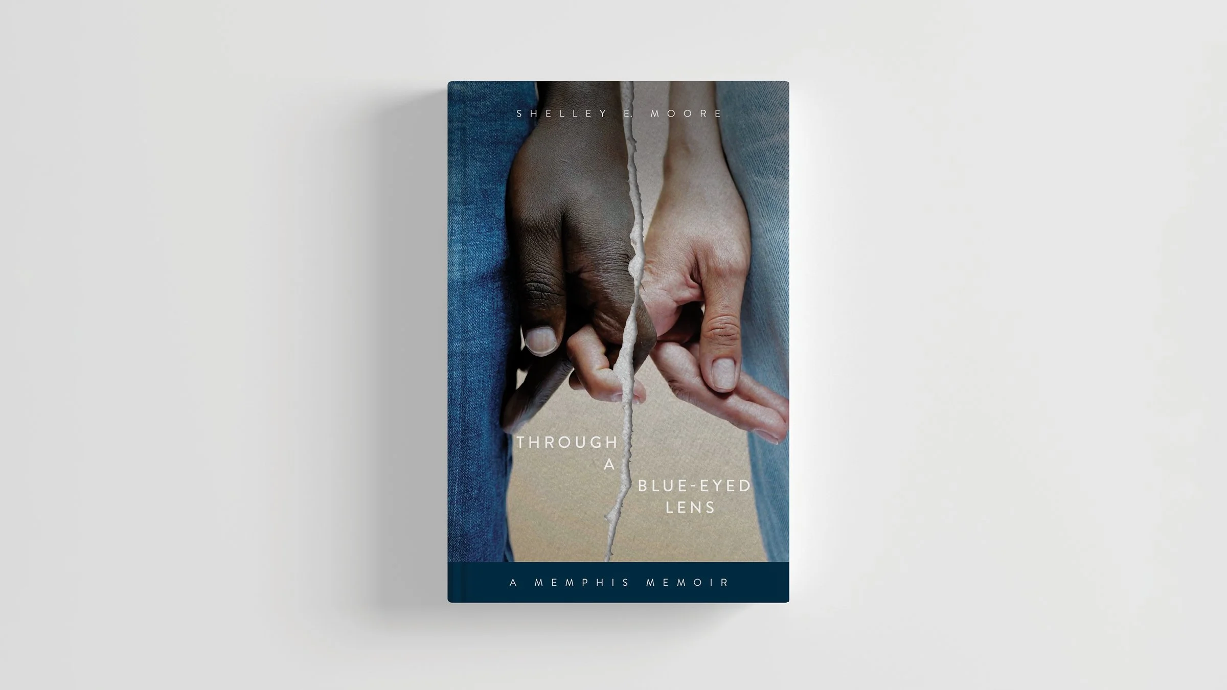 ThroughABlue-EyedLens-Cover-Mockup-2.jpg