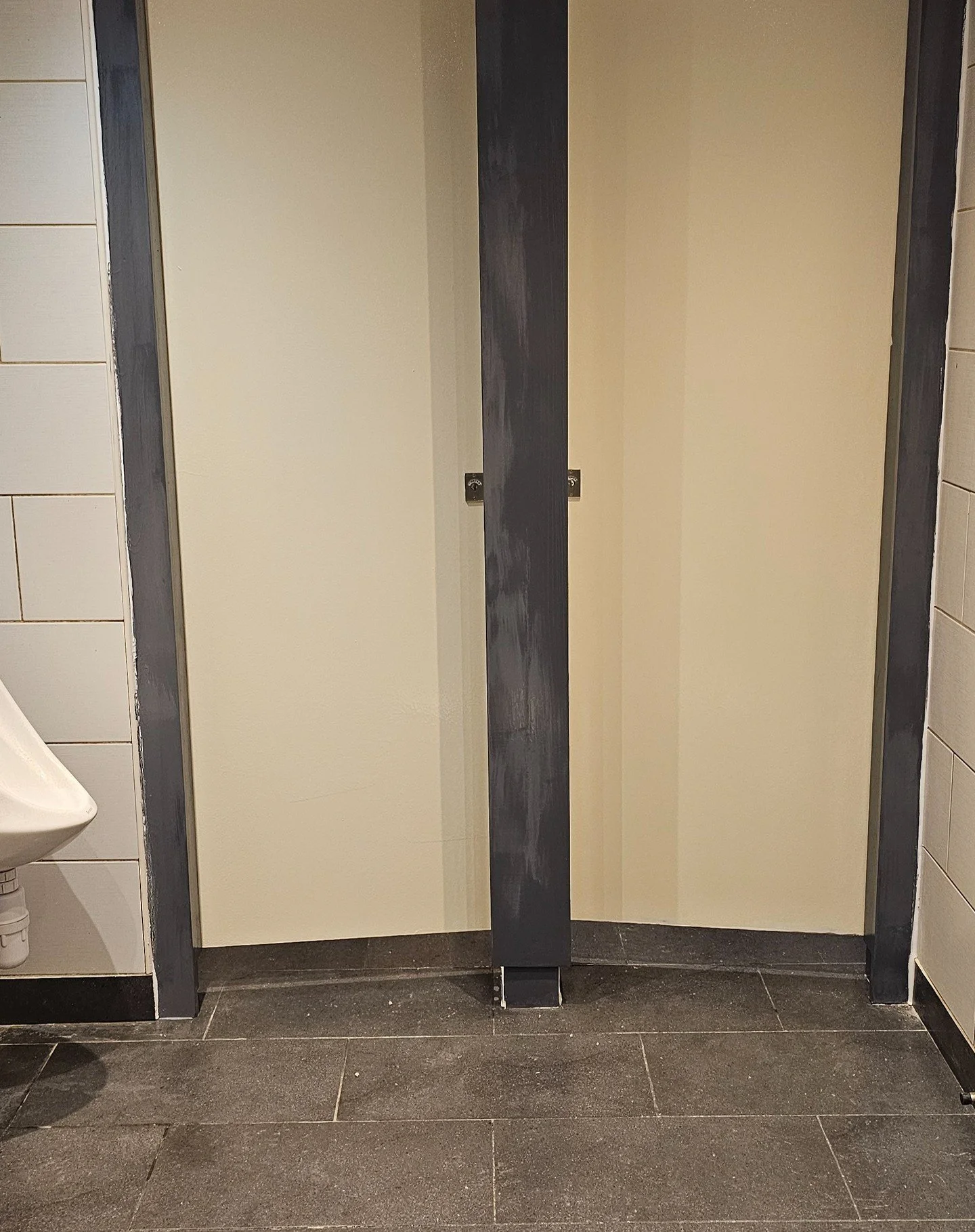Our latest project in Kingston-upon-Thames 

The start of this week has seen our engineers attending a pub in Kingston, to renovate their bathroom. The team put up a new stud wall, replaced doors, installed hygienic white rock wall cladding, and rene