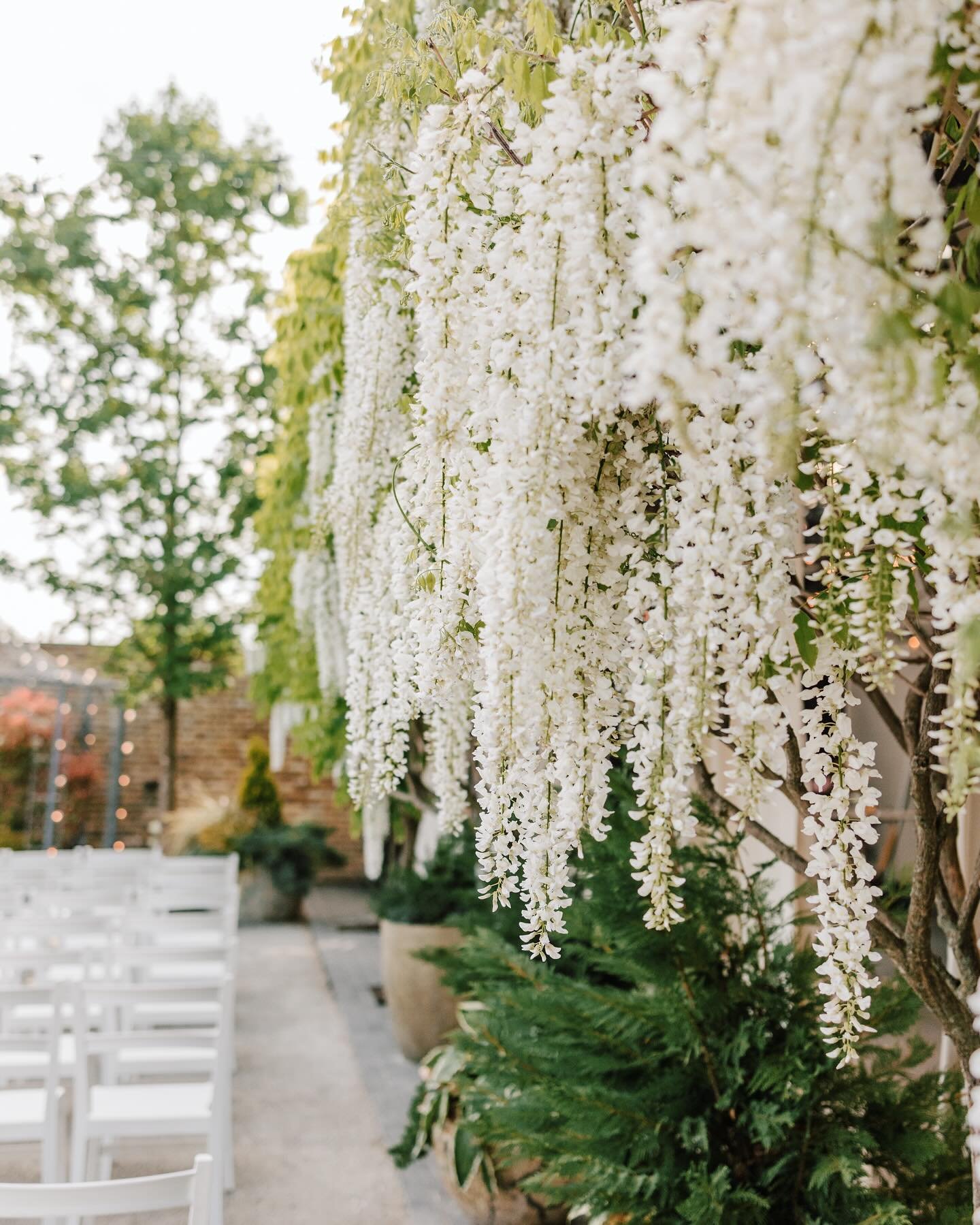 Feeling all the love at Sam + Kevin&rsquo;s magical wedding at @terrain_devonyard! 💐🌿 Look at these details!! @kelabevents and @trystfloral did an amazing job! The stunning florals created an enchanting atmosphere, and the wisteria bloomed just in 