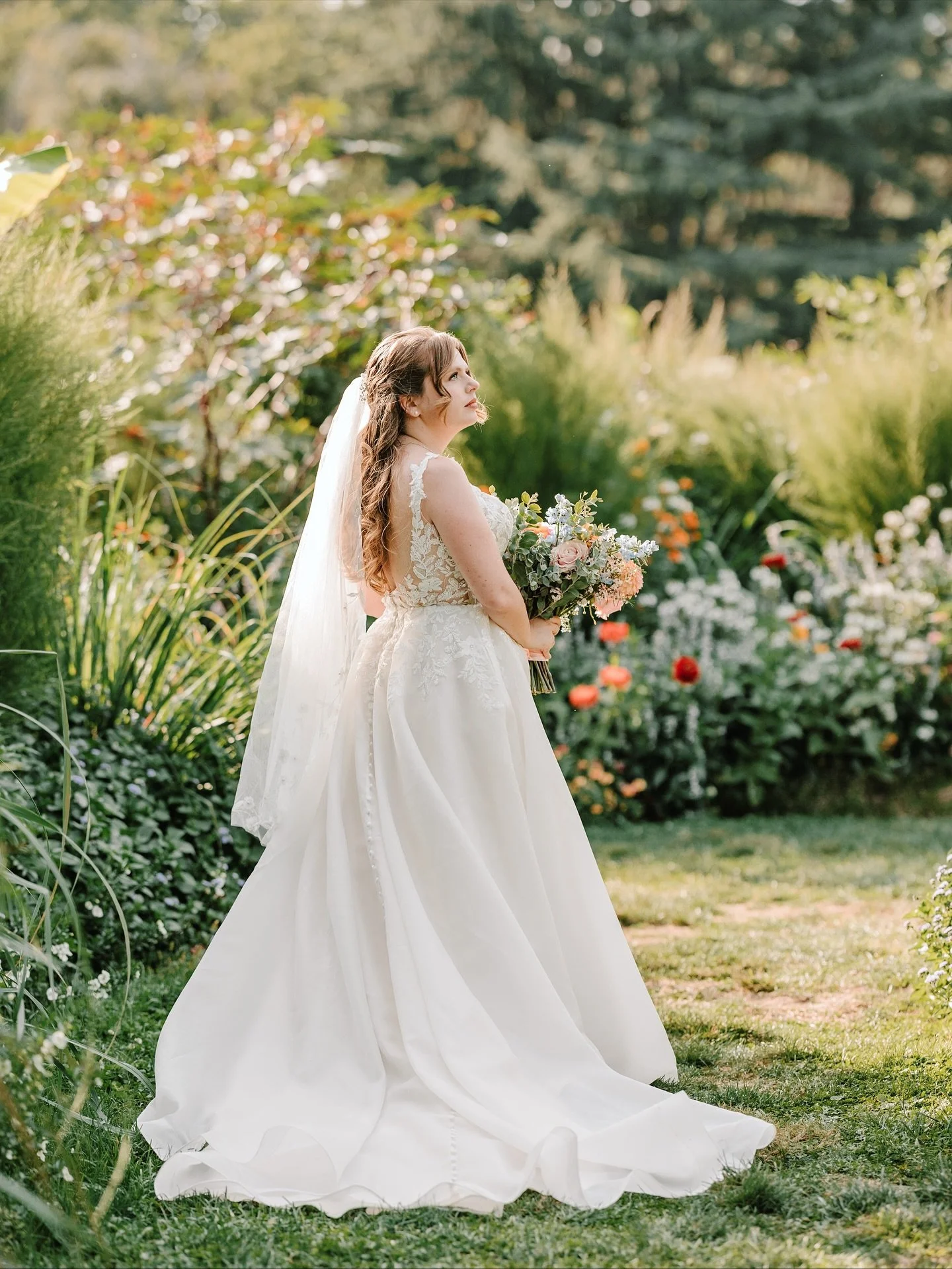 Bailey looked absolutely angelic wandering through the gardens at Morris Arboretum. Her dress caught the light just right, her bouquet overflowed with color and texture, and every frame felt soft, romantic, and full of life. Truly a vision among the 