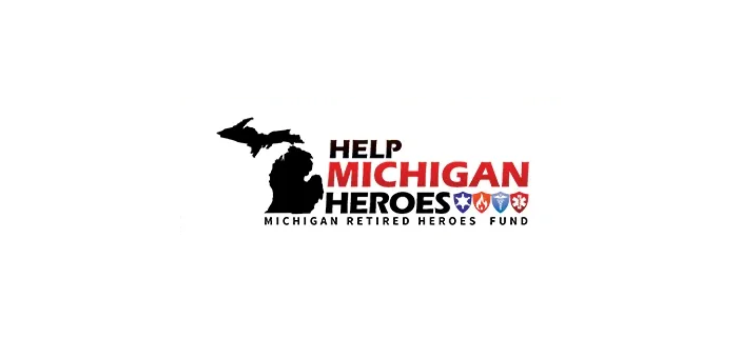 Logo for Help Michigan Heroes, a fund for retired Michigan heroes. The logo features a silhouette of the state of Michigan with a bird flying over it and five shield icons representing different branches of the military in red, blue, and white colors.