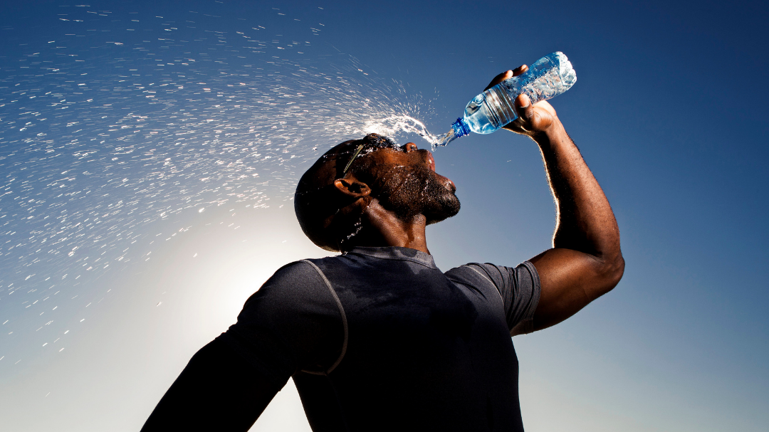 Athlete drinking water