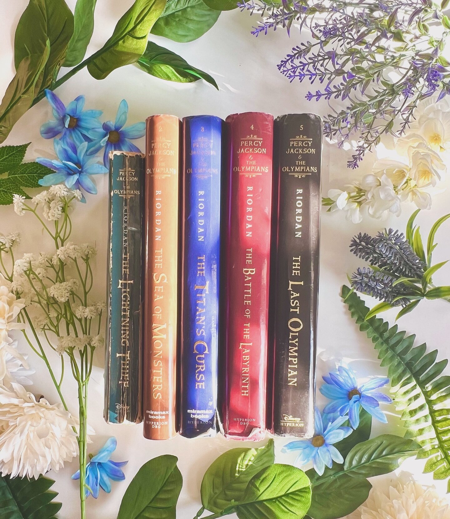 a love letter to the percy jackson books 💌

These books have seen a lot of love over the years, and these exact books have been in my hands since I was in middle school.

I recently reread the series in anticipation for the Disney+ show, and I felt 