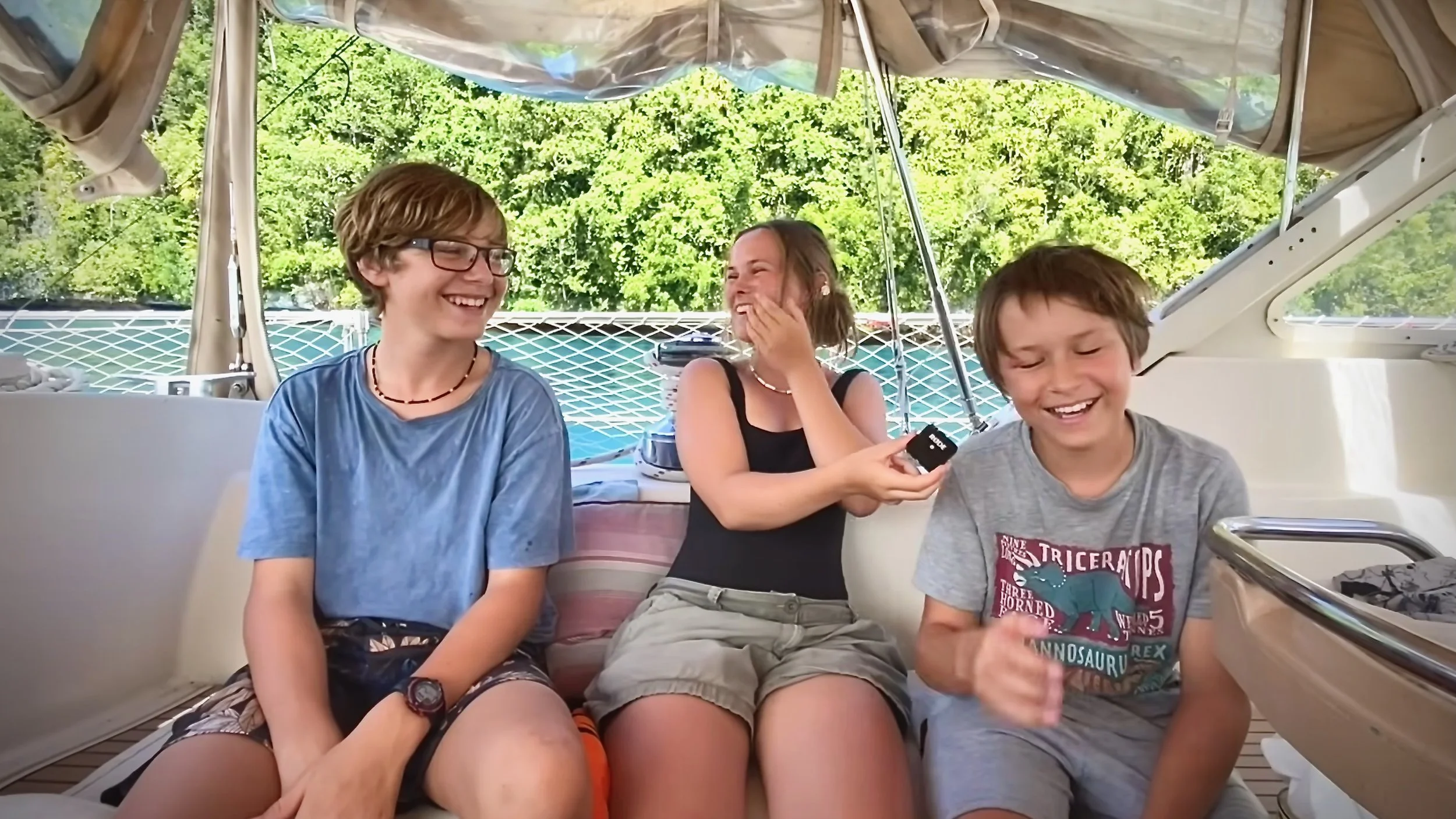 Darry, Rowan and Yewan being interviewed in the cockpit of S/V Mothership in Raja Ampat