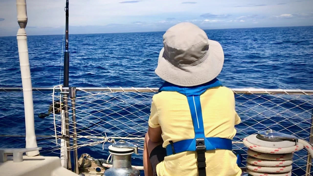 Boy - Darry from SV Mothership - sat in deck looking out to sea