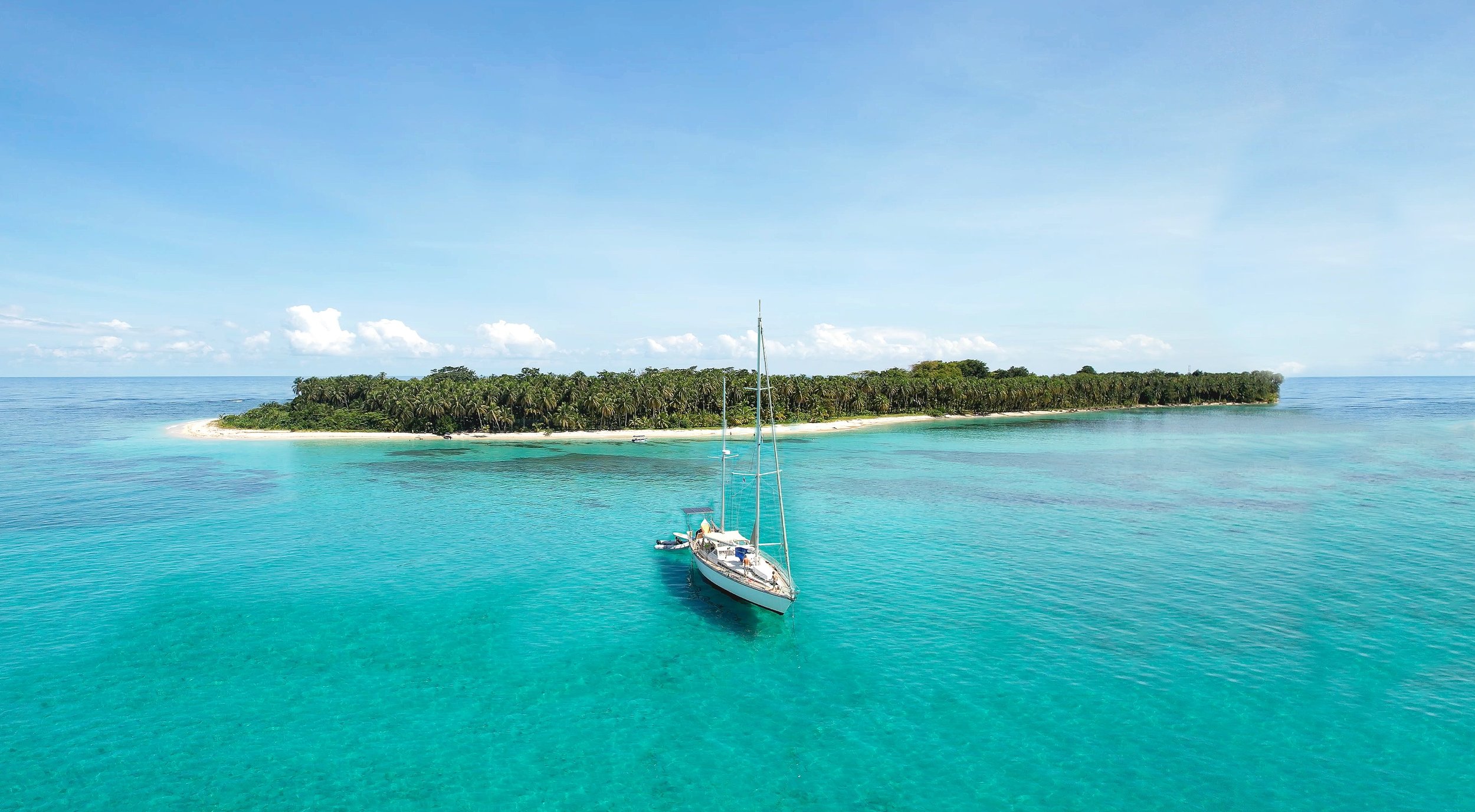 Amel Super Maramu at anchor starboard drone Zapatilla