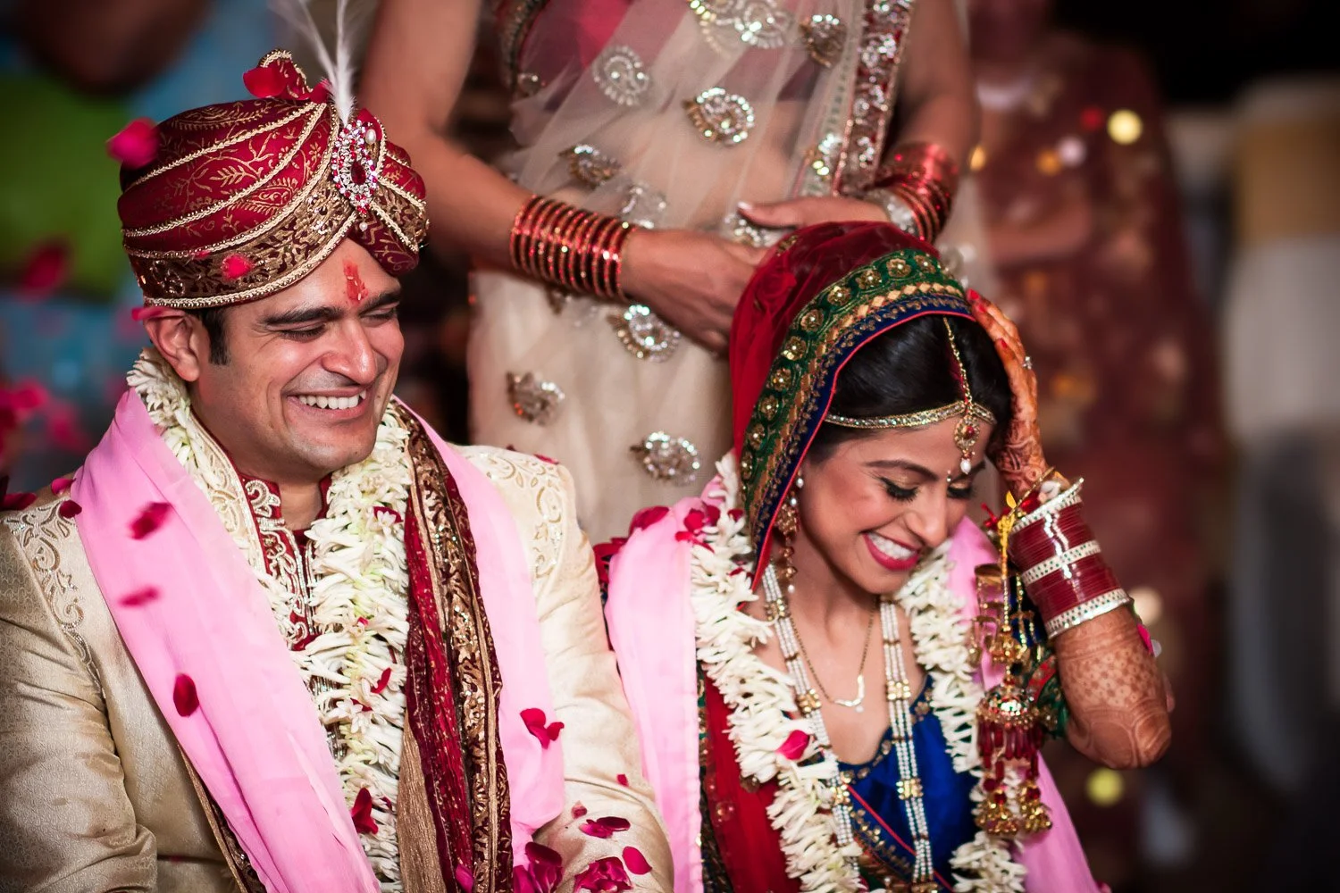 Gurugram Indian wedding couple showered with petals on mandap