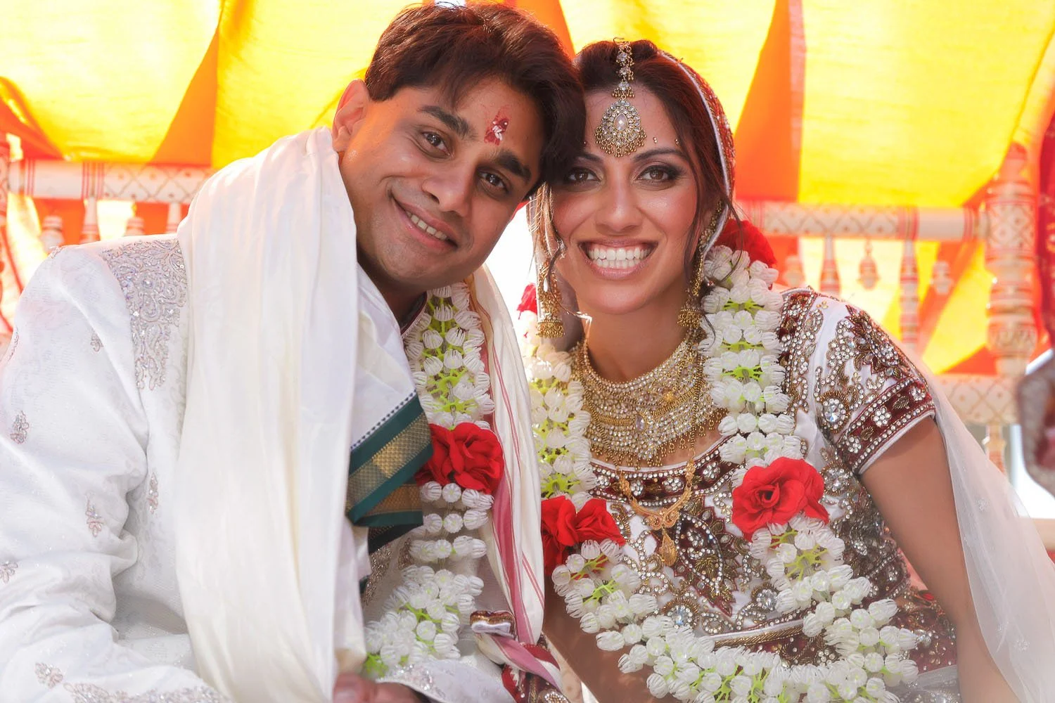 San Diego Indian wedding couple on shaadi mandap