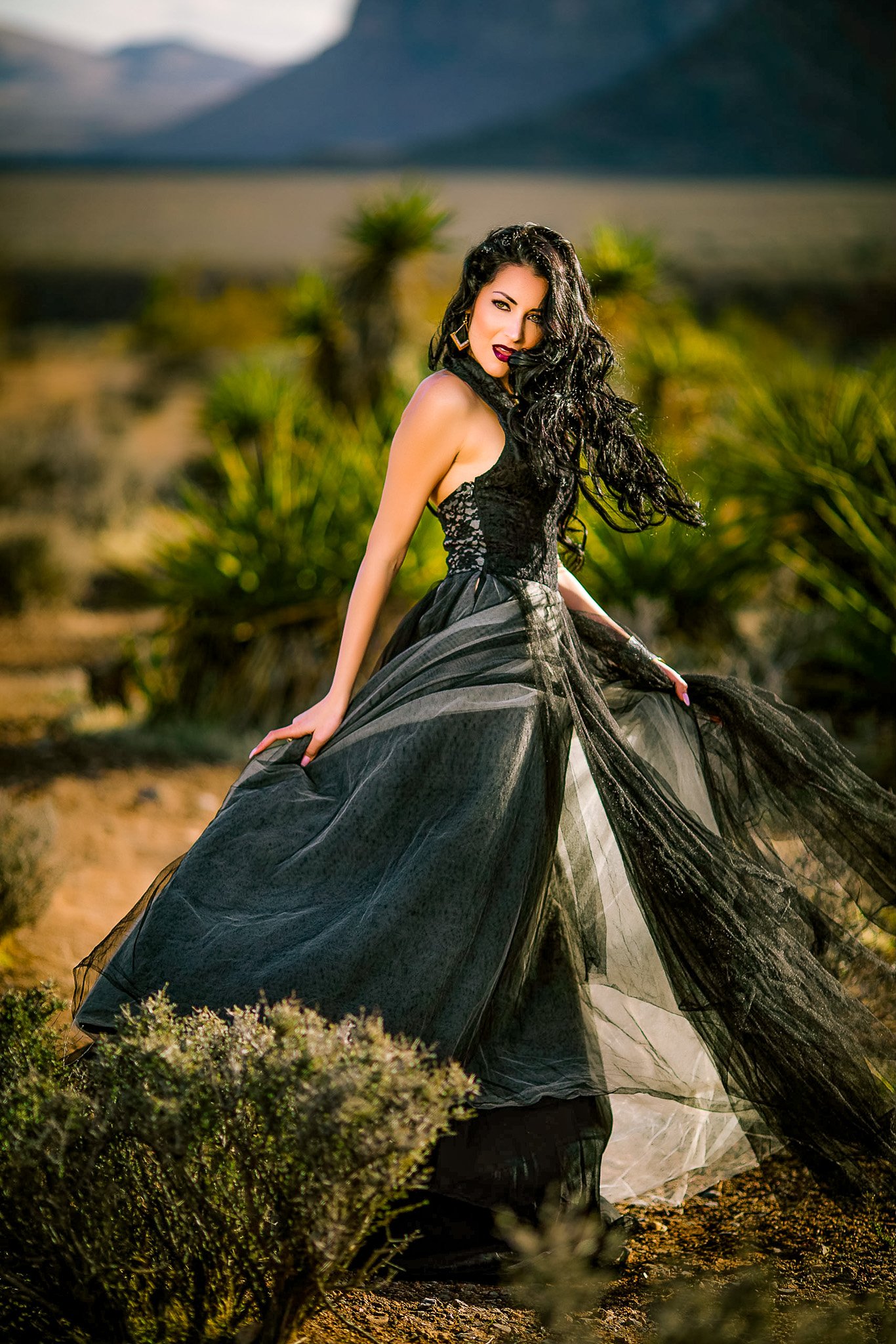 Fashion Portrait Session at Las Vegas desert with the model wearing a black and white dress