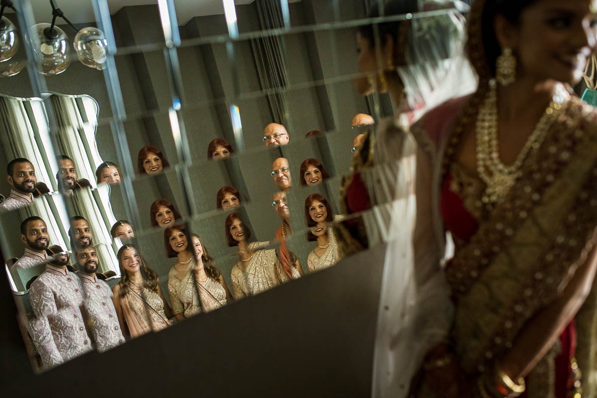 Indian family portrait in mirror reflection at Renaissance Schaumburg Indian wedding