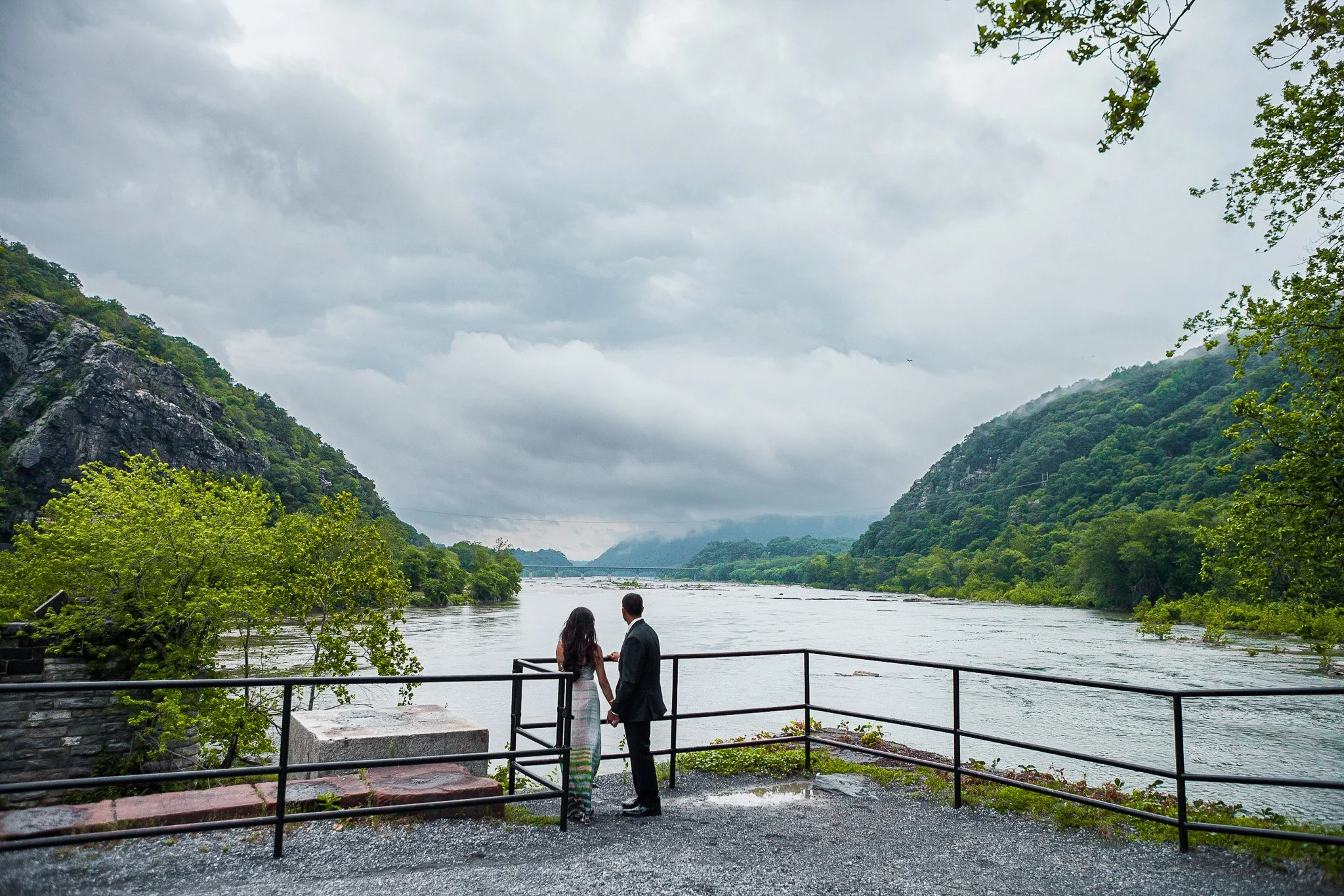 Engagement Portrait Session at Harper’s Ferry in West Virginia overlooking a beautiful lake amidst the mountains  